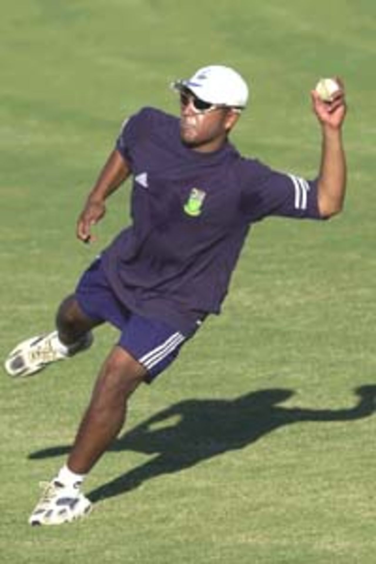 12 Aug 2000: Paul Adams of the South African Cricket Team in action during training at Allan Border Field in Brisbane, Australia. The South African team are preparing for the upcoming Super Challenge 2000 series against Australia.