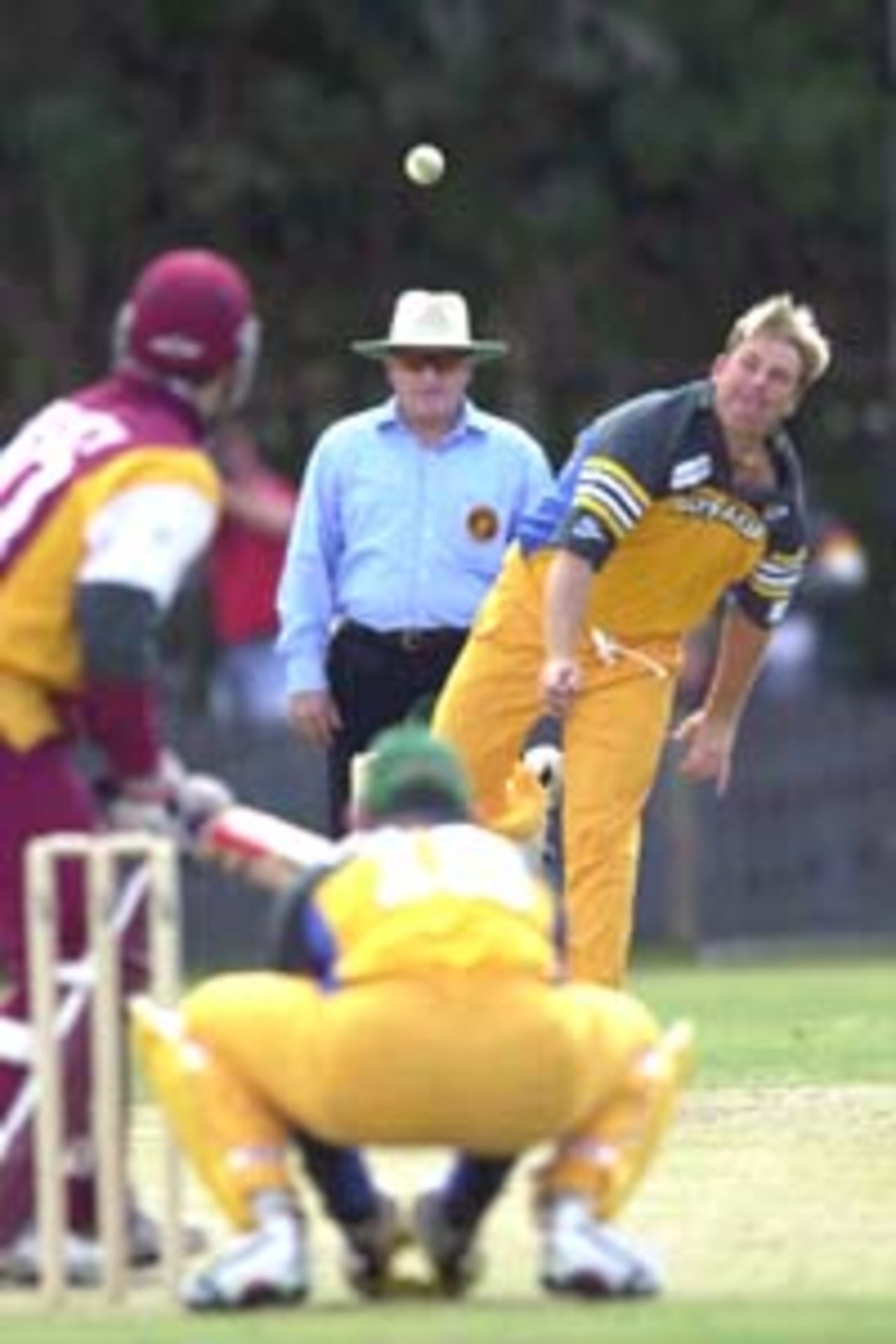 13 Aug 2000: Shane Warne of Australia in action against Queensland at Allan Border Field in Brisbane, Australia. The Australian team are playing the practice game against Queensland in Brisbane to prepare for the Super Challenge 2000 against South Africa.