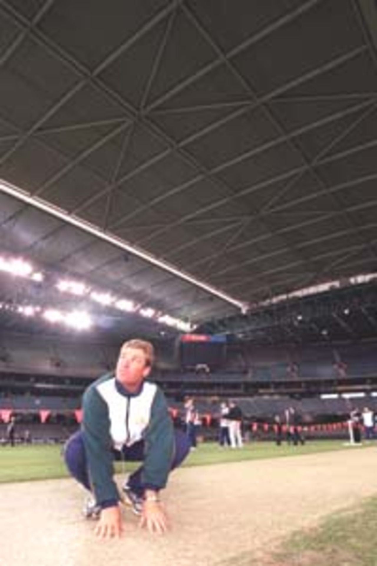 14 Aug 2000: Shane Warne of Australia inspects Colonial Stadium, venue for the Super Challenge 2000 one day cricket series beginning Wednesday in Melbourne, Australia.