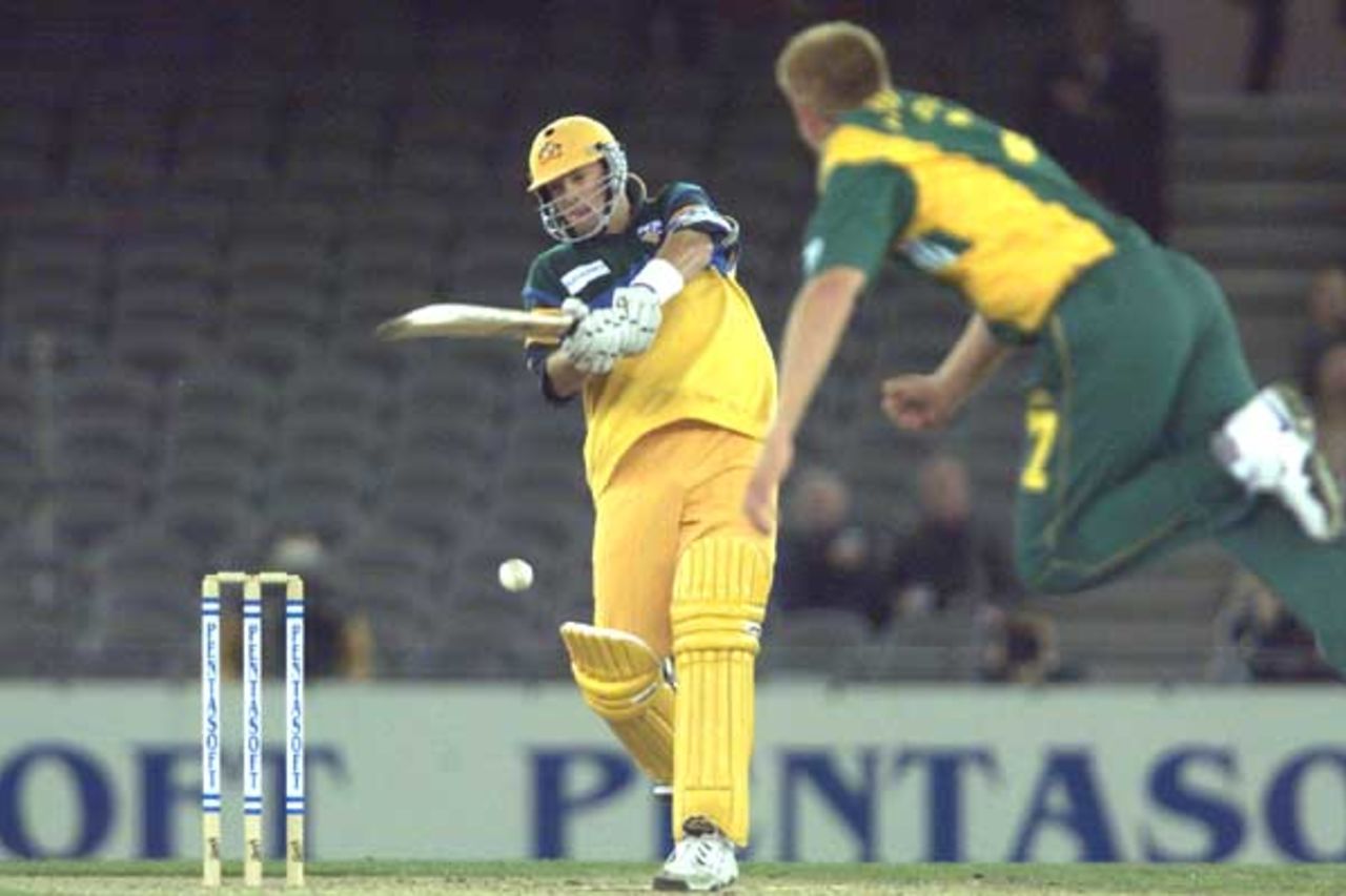 16 Aug 2000: Mark Waugh of Australia plays to a shot bowled by Shaun Pollock of South Africa, in the match between Australia and South Africa, in game one of the Super Challenge 2000, played at Colonial Stadium in Melbourne, Australia. This is the first game of cricket to be played indoors.