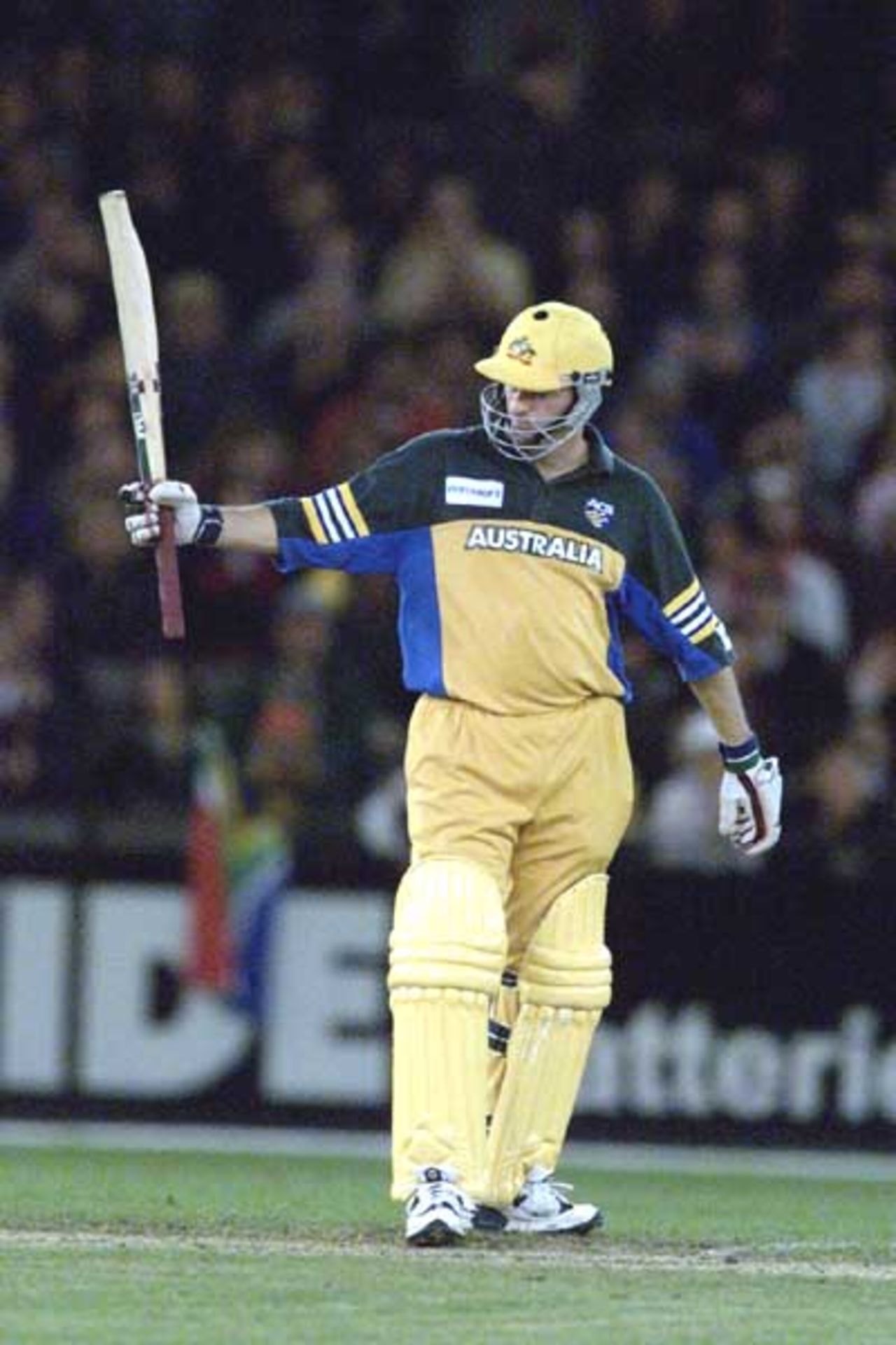 16 Aug 2000: Steve Waugh of Australia celebrates making 50 runs, in the match between Australia and South Africa, in game one of the Super Challenge 2000, played at Colonial Stadium in Melbourne, Australia. This is the first game of cricket to be played indoors.
