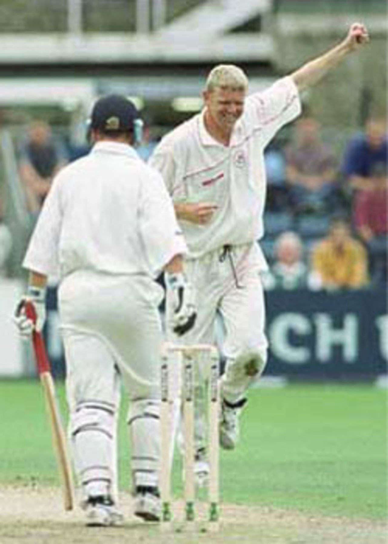 Martin pumps his fist after picking up the wicket of Snape, NatWest Trophy, 2000, 2nd Semi Final, Gloucestershire v Lancashire, The Royal & Sun Alliance County Ground, Bristol, 13 August 2000.