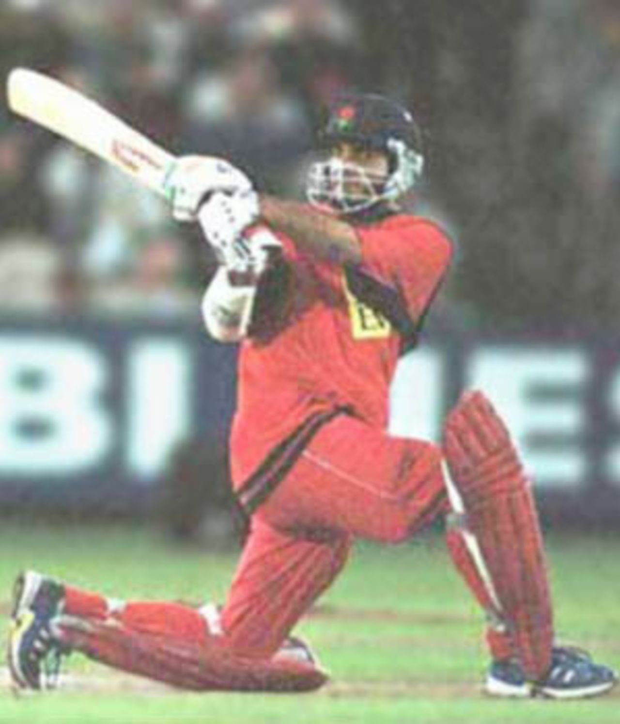 Ganguly goes down on one knee and smacks the ball through the on side, National League Division One, 2000, Lancashire v Kent, Old Trafford, Manchester, 15 August 2000.