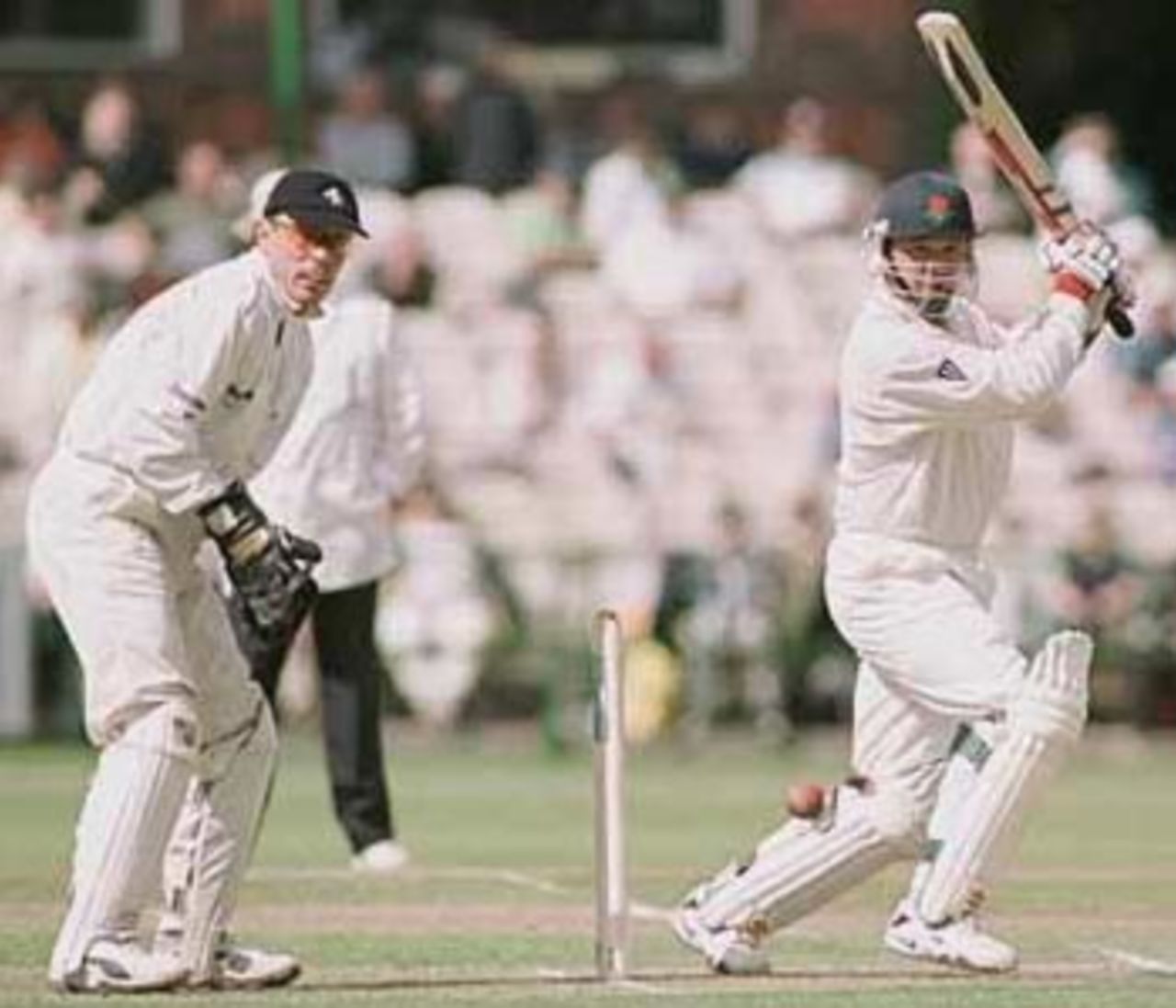 Warren Hegg square cuts as Paul Nixon looks on, PPP healthcare County Championship Division One, 2000, Lancashire v Kent, Old Trafford, Manchester, 17-20 August 2000(Day 1).