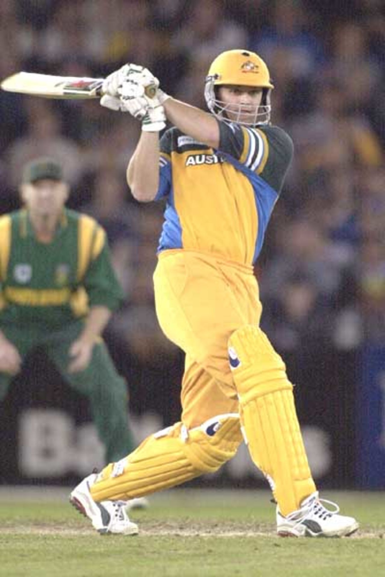 18 Aug 2000: Adam Gilchrist of Australia hit one away in the match between Australia and South Africa, in game two of the Super Challenge 2000 played at the Colonial Stadium, Melbourne, Australia