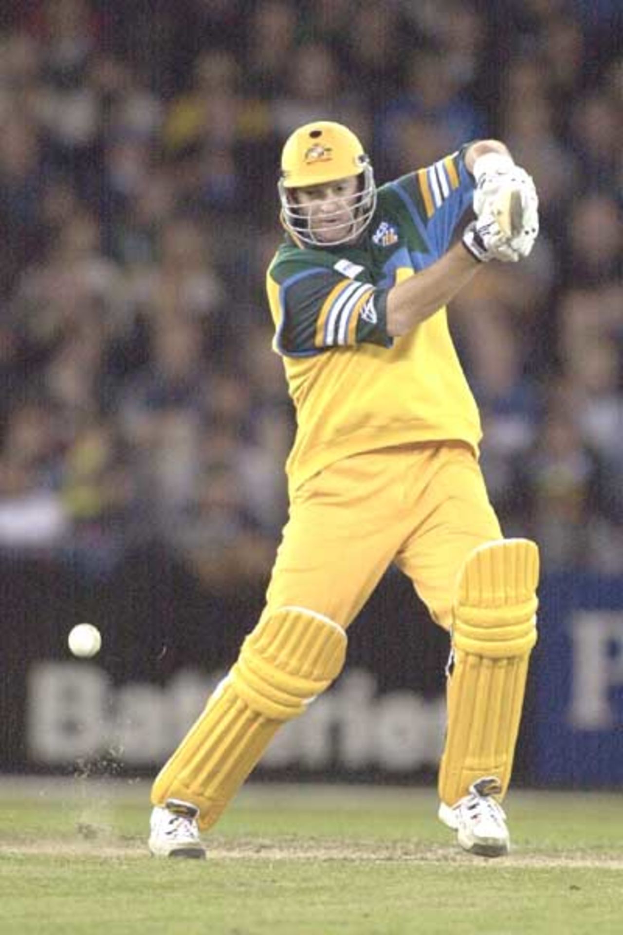 18 Aug 2000: Mark Waugh of Australia hits one away in the match between Australia and South Africa, in game two of the Super Challenge 2000 played at the Colonial Stadium, Melbourne, Australia.