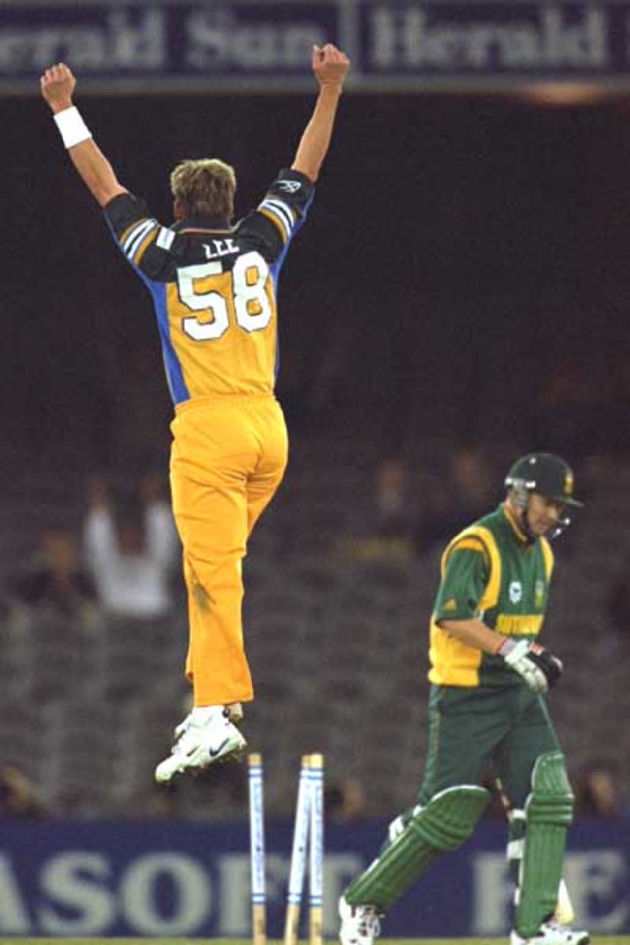 20 Aug 2000: Brett Lee of Australia celebrates the wicket of Daryll Cullinan of South Africa, in the match between Australia and South Africa, in game three of the Super Challenge 2000, played at Colonial Stadium in Melbourne, Australia.