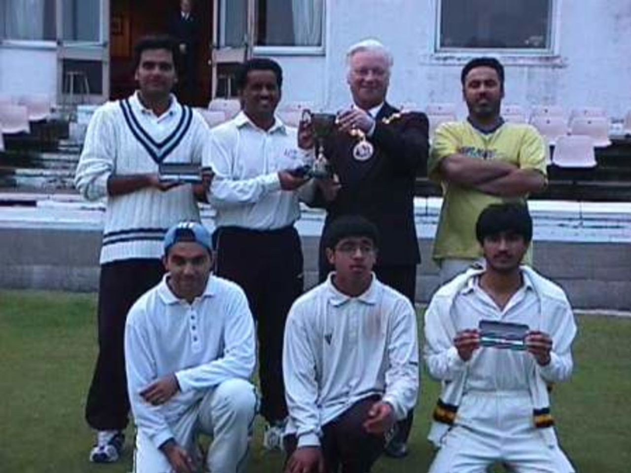 The victorious Attock team with The Mayor of Hyndburn Councillor Doug Hayes