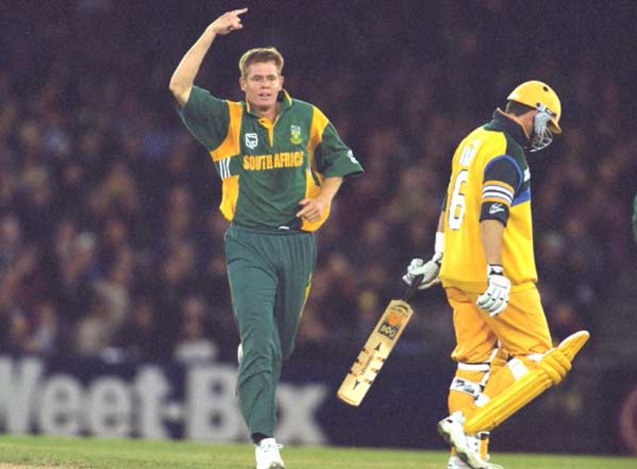 20 Aug 2000: Shaun Pollock of South Africa celebrates the wicket of Mark Waugh of Australia, in the match between Australia and South Africa, in game three of the Super Challenge 2000, played at Colonial Stadium in Melbourne, Australia. South Africa defeated Australia by 8 runs.