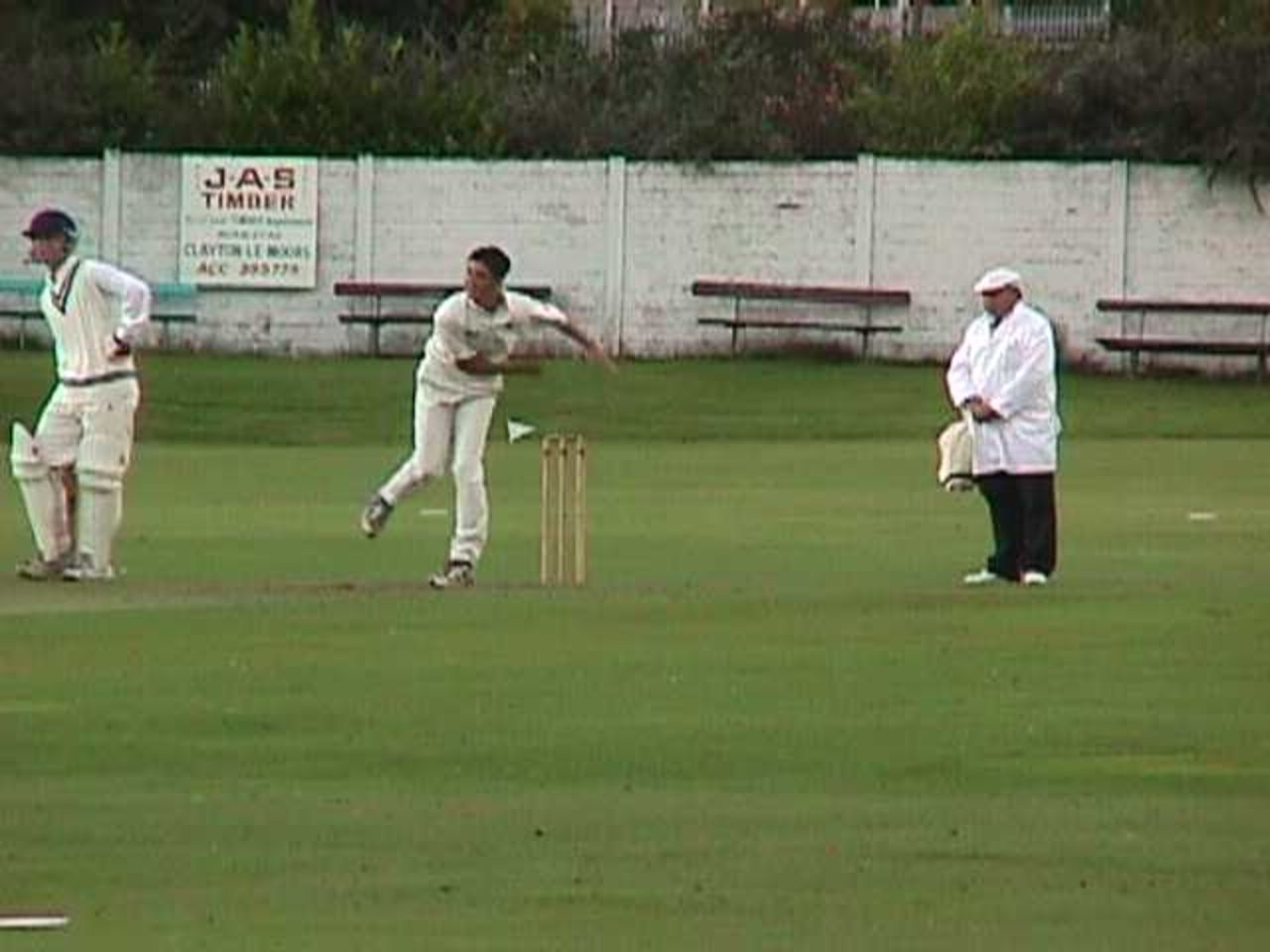 Enfield's Sam Reidy bowling during his economical seven over spell of 0 - 13 against Bacup