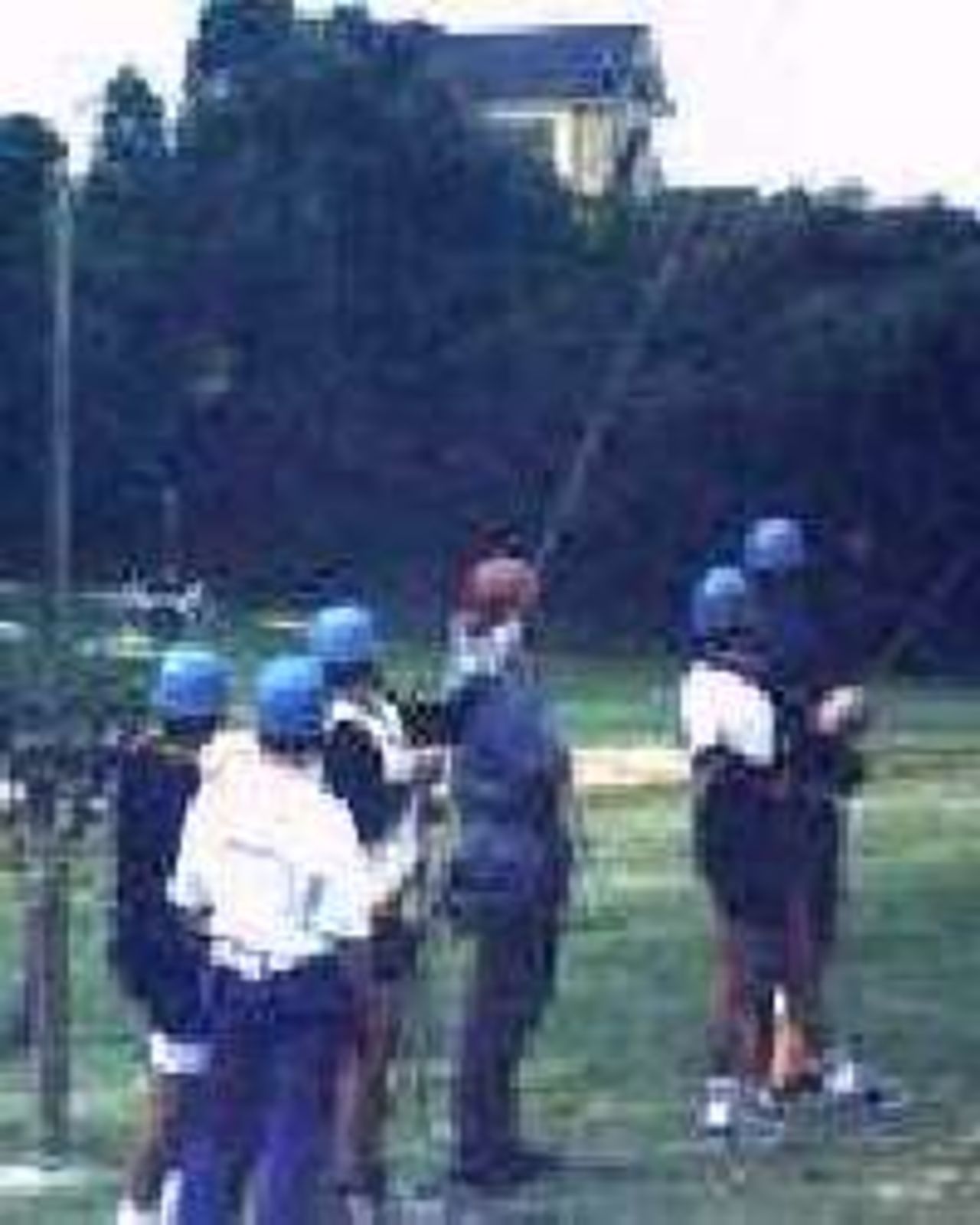 Western Warriors watch as their captain Tom Moody whoops it up on the flying fox