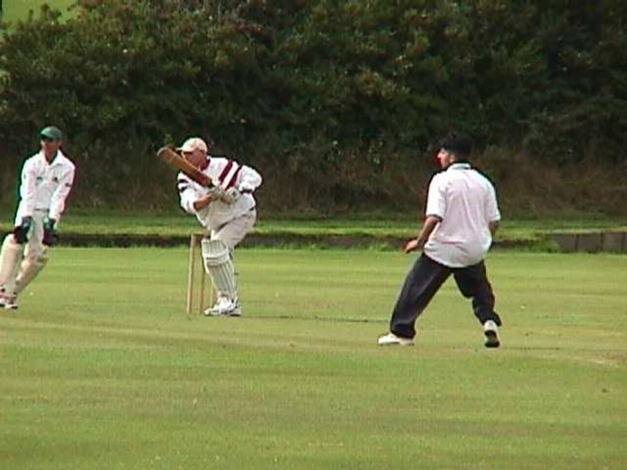 In a photograph reminiscent of a vintage 1981 snap taken in a record breaking season, Accrington coach Graham Beech shows he can still remember how to play the classic cover drive off Zafar Aslam