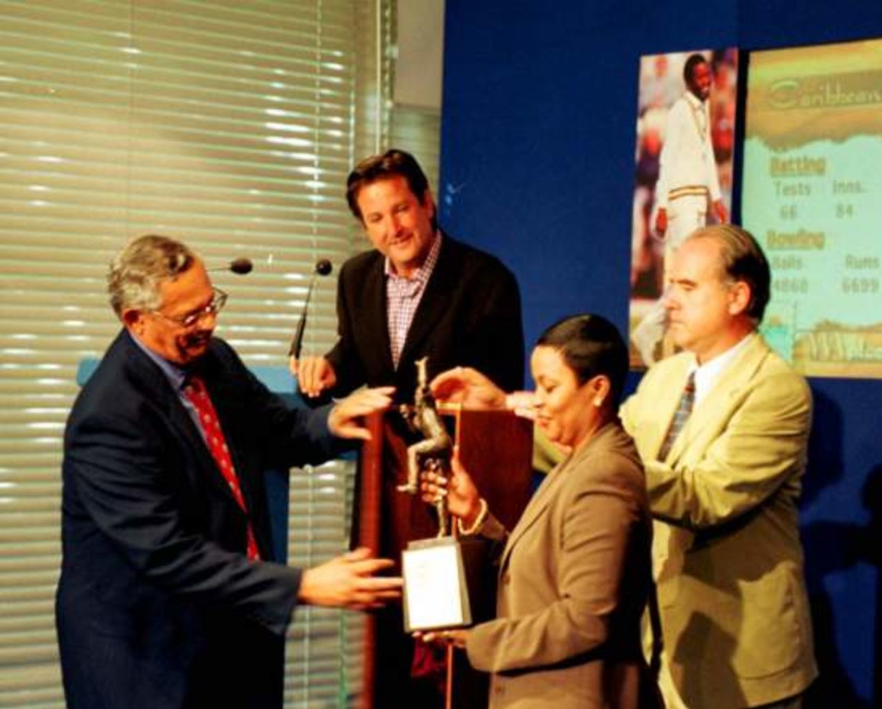 WICB President, Patrick Rousseau, Mark Nicholas (background), Mrs. Connie Marshall and Mr.Tim Lamb Chief  Executive Officer of the ECB at the unveiling ceremony