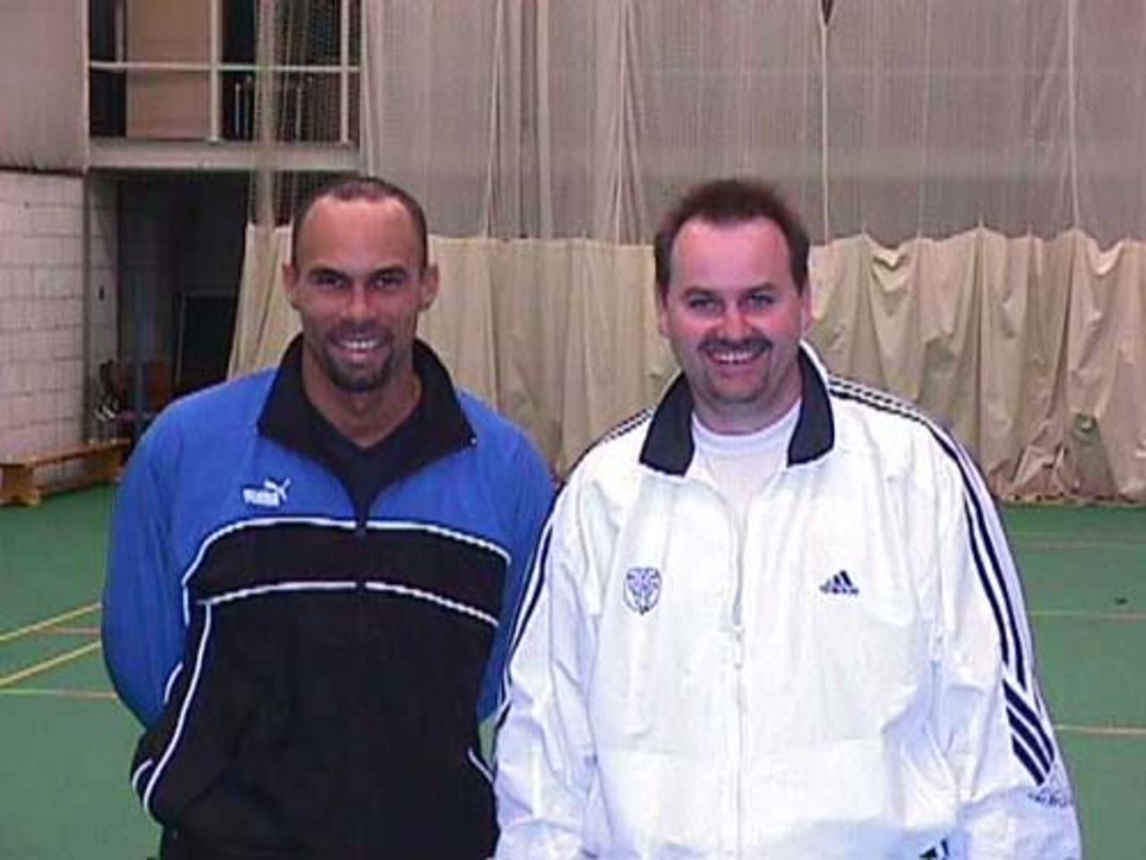 Danish Development Officer Simon Talbot with Jimmy Adams