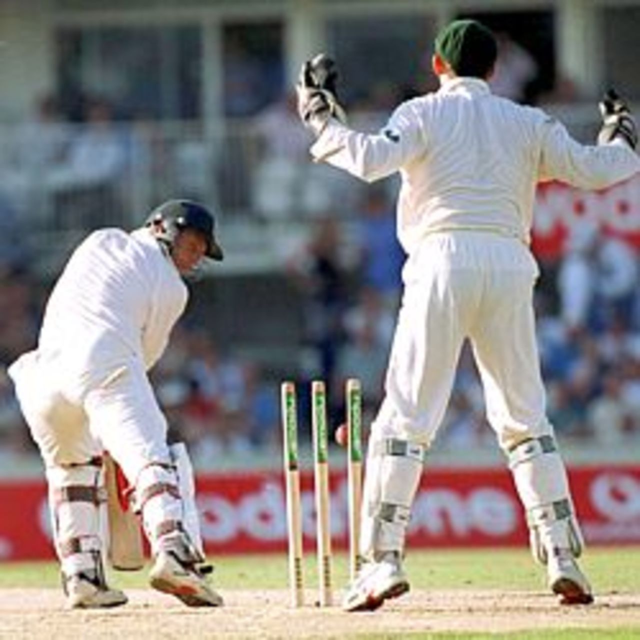Michael Atherton of England is bowled for 13 by Shane Warne of Australia during the 2nd day of the 5th Ashes Test between England and Australia at The AMP Oval, London.