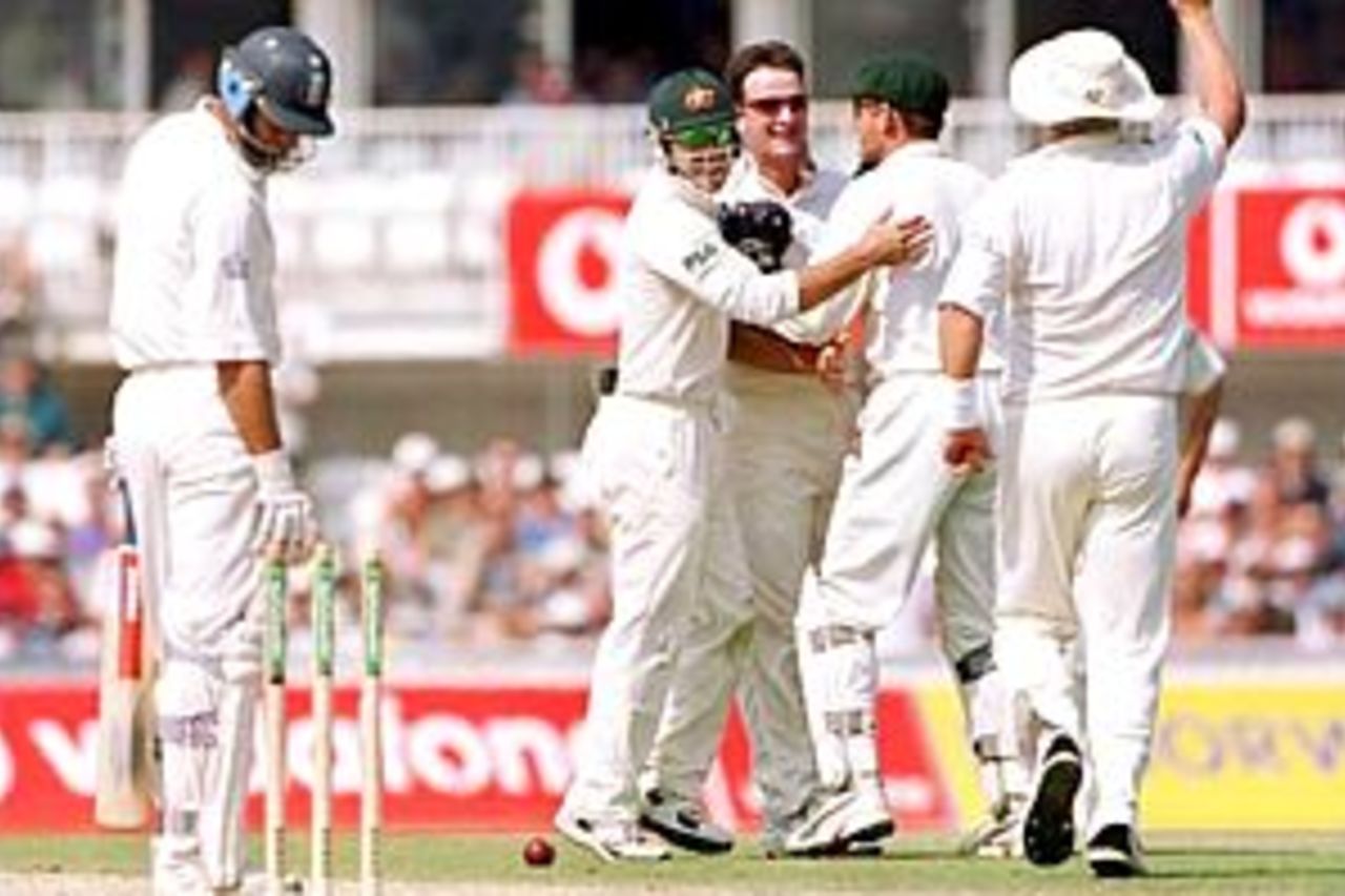 Australia celebrates the wicket of Nasser Hussain of England during the 3rd day of the 5th Ashes Test between England and Australia at The AMP Oval, London.