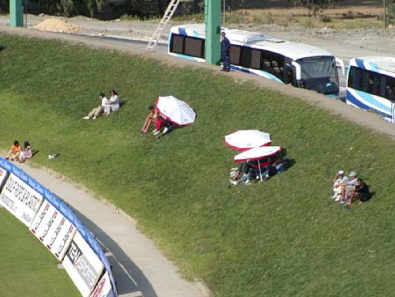 A few spectators at the Stadium enjoy some rare moments during the match , Morocco Cup, 2nd ODI at Tangier, Pakistan v Sri Lanka, 14 Aug 2002