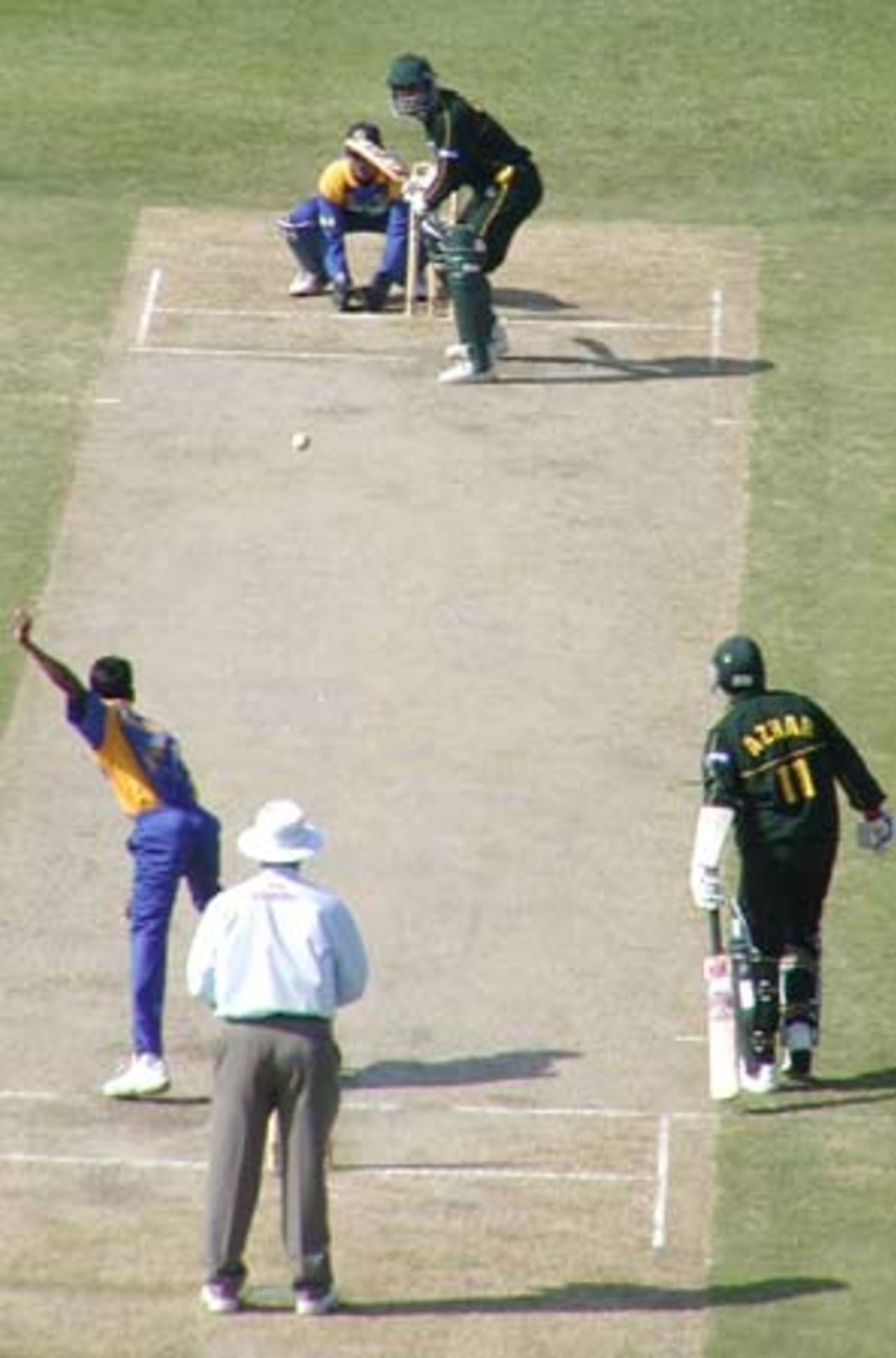 Chandana bowling to Razzaq, Morocco Cup, 4th ODI at Tangiers, Pakistan v Sri Lanka, 17 Aug 2002