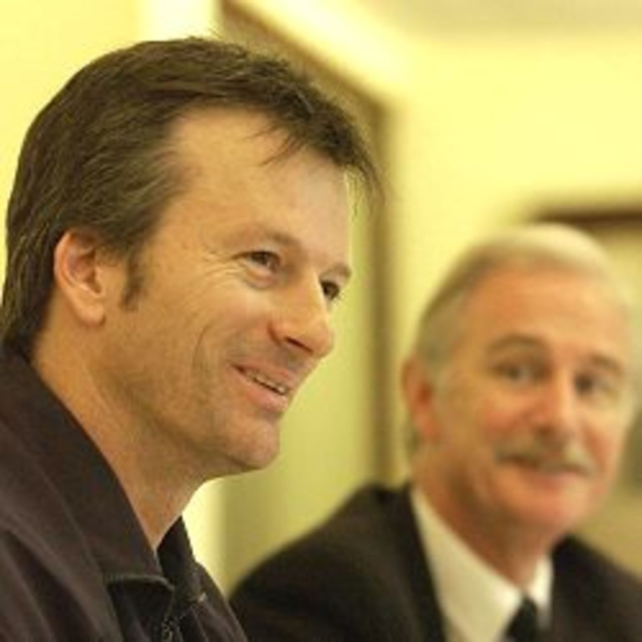 CANTERBURY - AUGUST 19: Steve Waugh of Australia talks to the media with Kent Chief Executive Paul Millman on his arrival at Kent County Cricket Club where will play for the rest of the season in Canterbury, England on August 19, 2002.