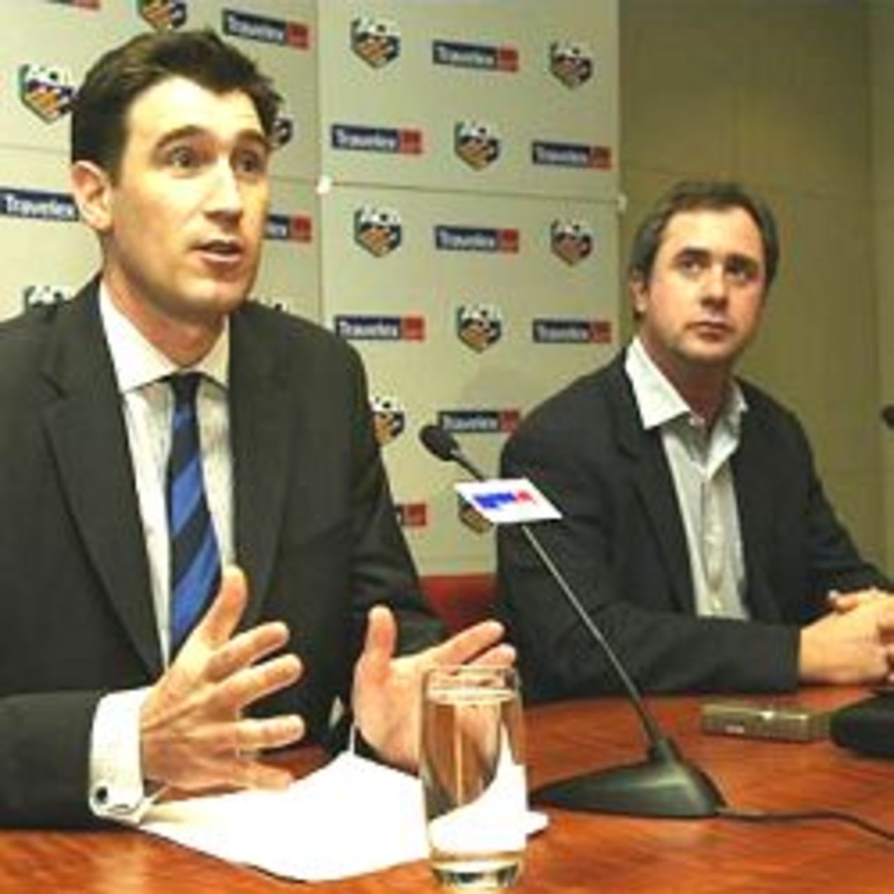 MELBOURNE - AUGUST 22: James Sutherland, Chief Executive of the ACB and Tim May, Chief Executive of the ACA, during an ACB/ACA press conference held at the ACB Office, Melbourne, Australia on August 22, 2002.
