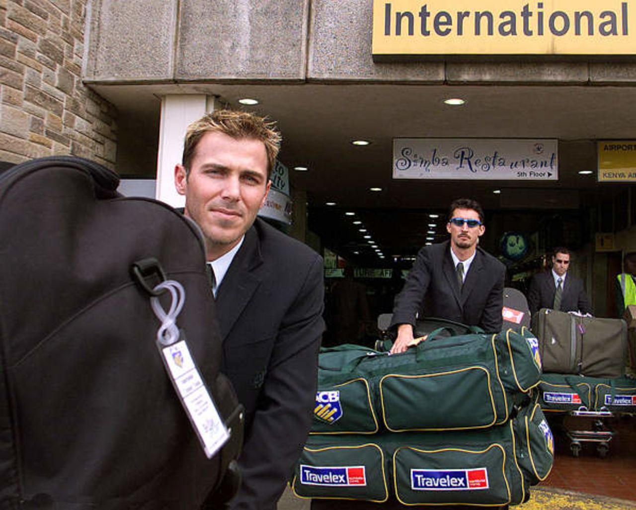 Damien Martyn, Michael Bevan and Jason Gillespie leave the Nairobi airport