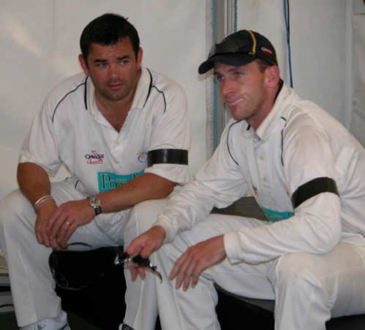Hampshire captain John Crawley relaxes with former England rugby captain Will Carling