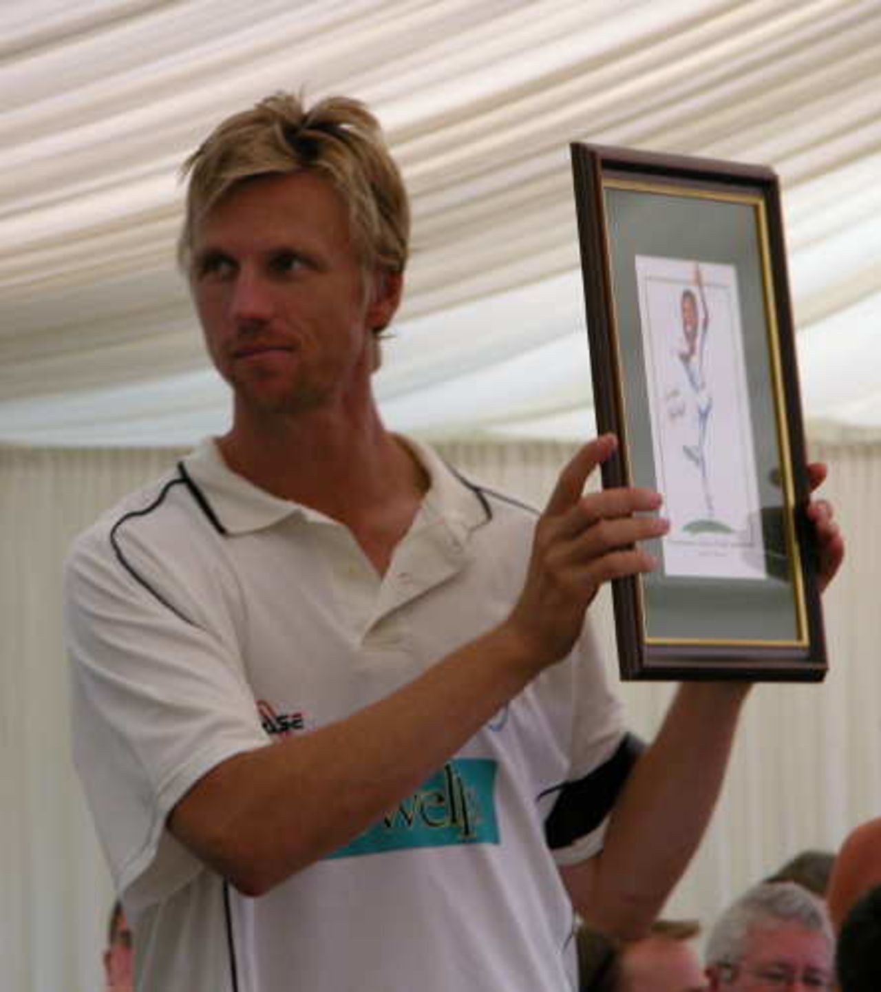 Alan Mullally helps out at the lunch time auction