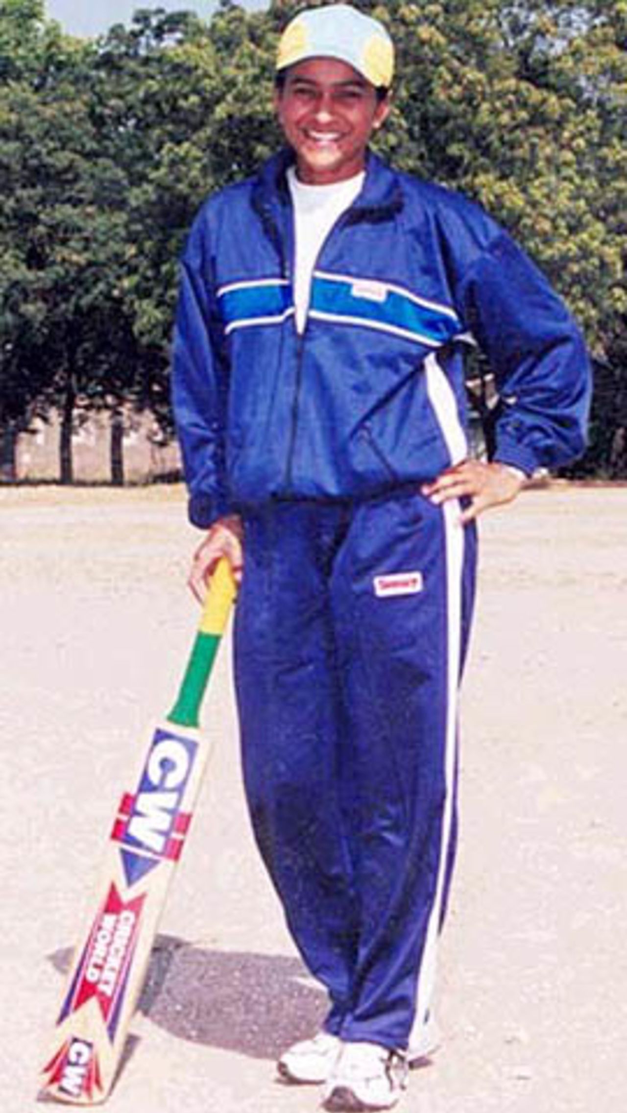 Kalyani Dhokarikar poses, ready with bat in hand