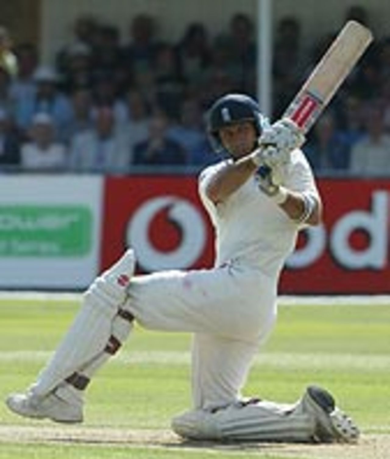 Nasser Hussain sweeps on the way to his hundred against South Africa at Trent Bridge