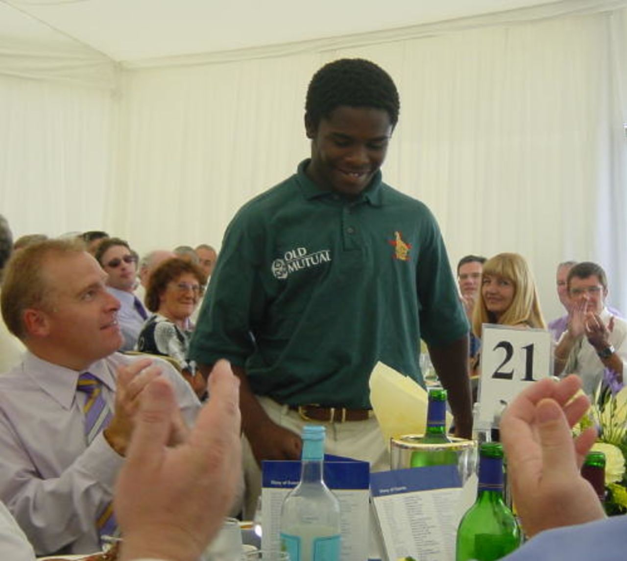 Zimbabwean Test cricketer Stuart Matsinkenyeri is introduced to the guests