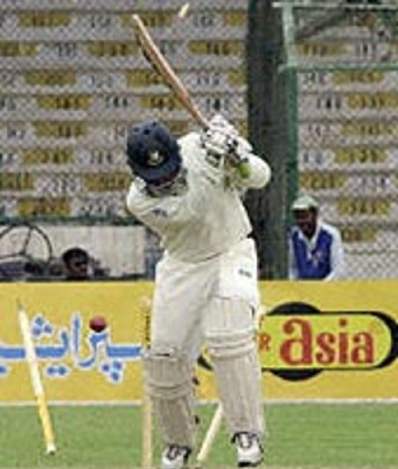 Umar Gul gets his first Test wicket as he clean bowls Javed Omar in Pakistan's Test against Bangladesh at Karachi