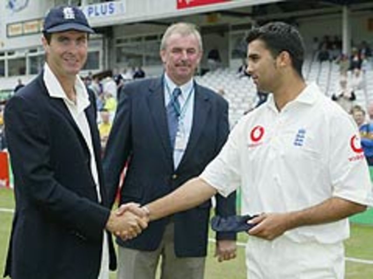 Kabir Ali receives his England cap from Michael Vaughan, England v South Africa, 4th Test, August 20, 2003