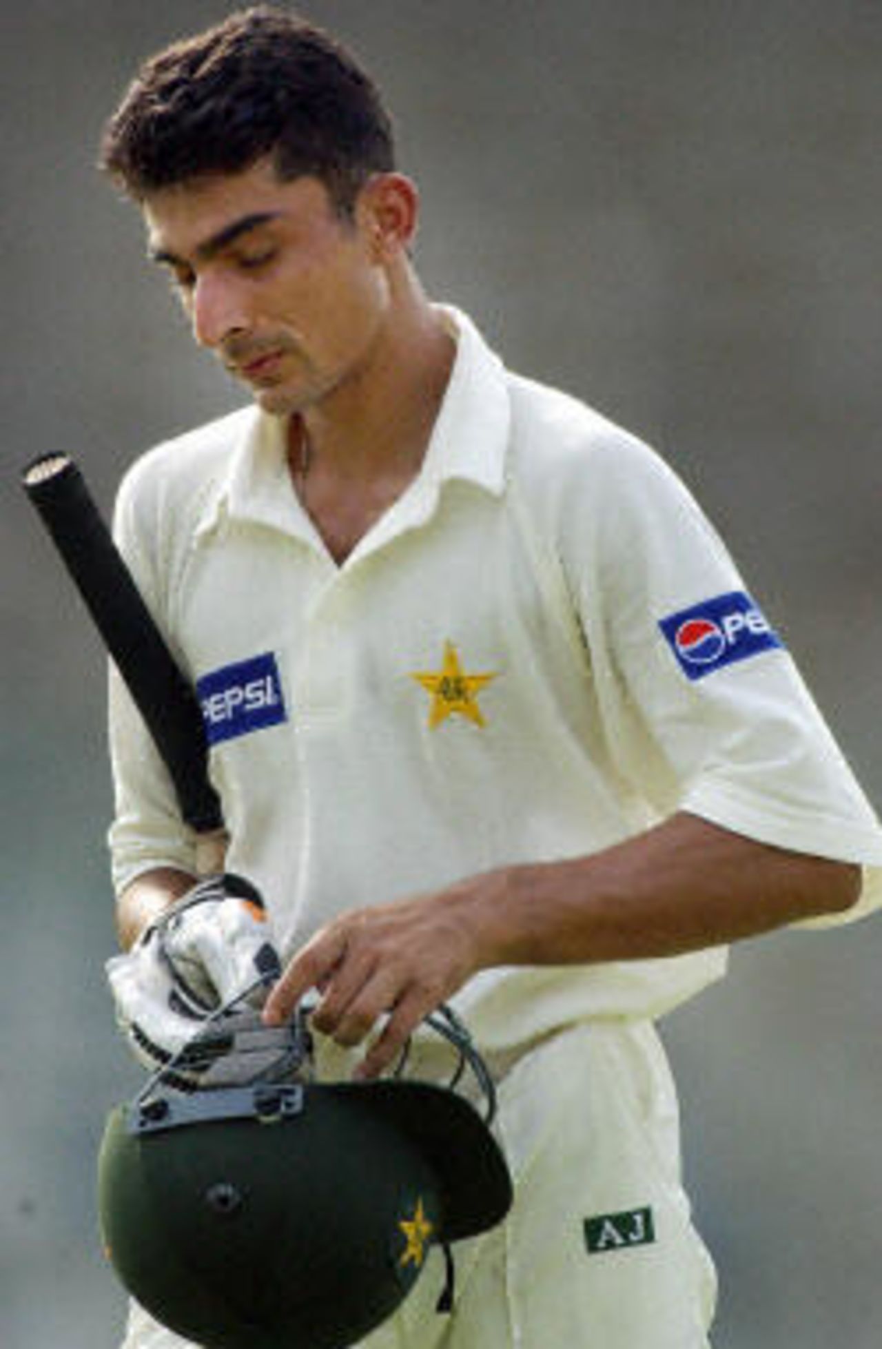 Yasir Hameed walks off after being dismissed for 170 during the second day of the first Test, Bangladesh and Pakistan, 21 August 2003.