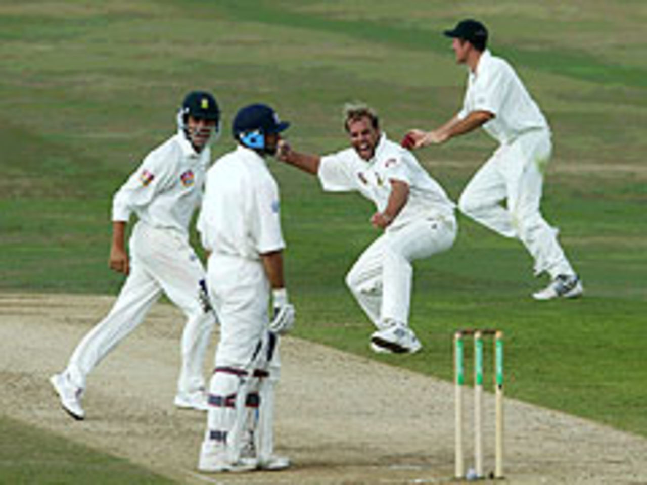 The South Africans are euphoric as Nasser Hussain falls lbw to Jacques Kallis