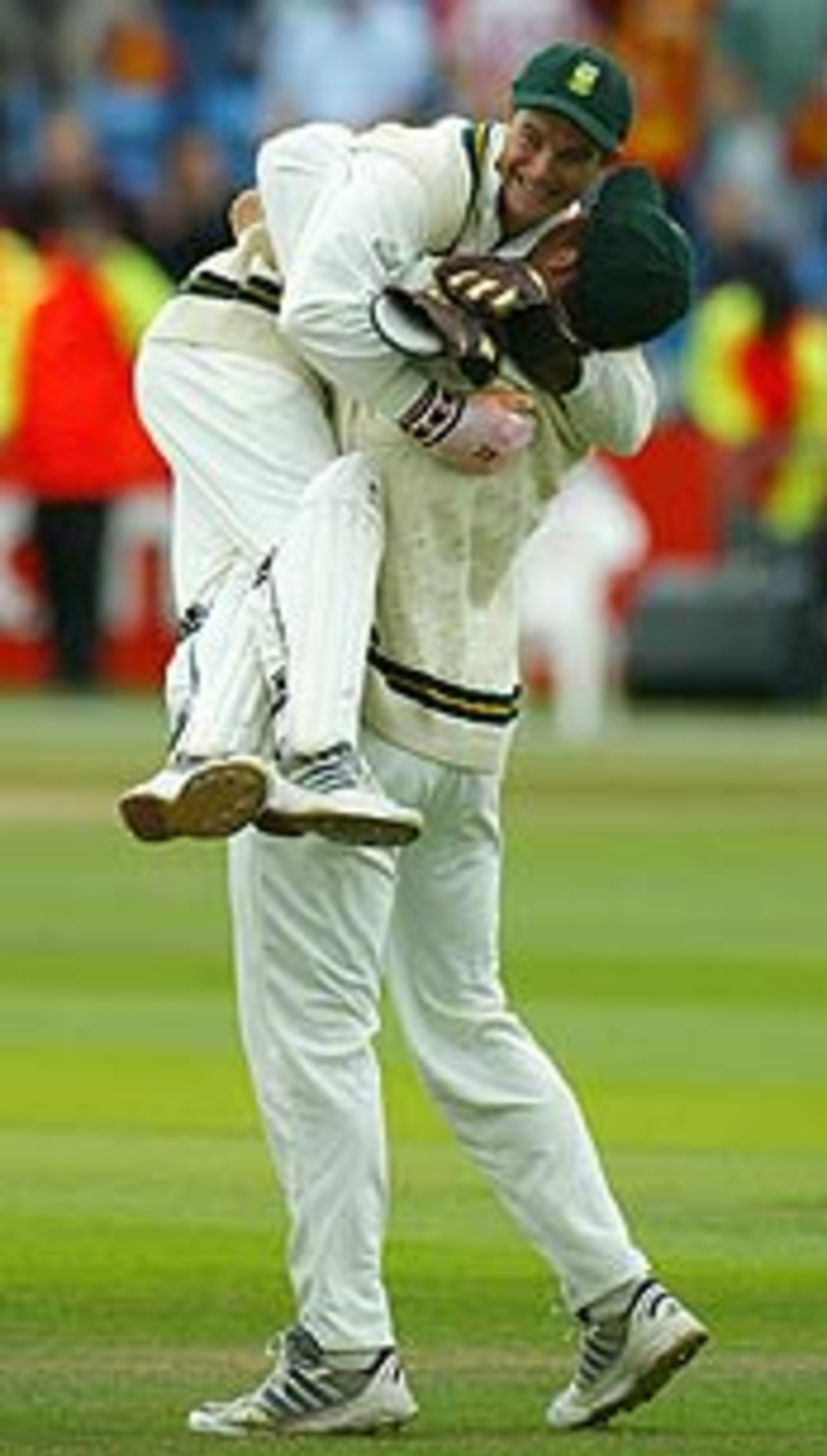 Graeme Smith and Mark Boucher celebrate, England v South Africa, 4th Test Headingley, August 25 2003