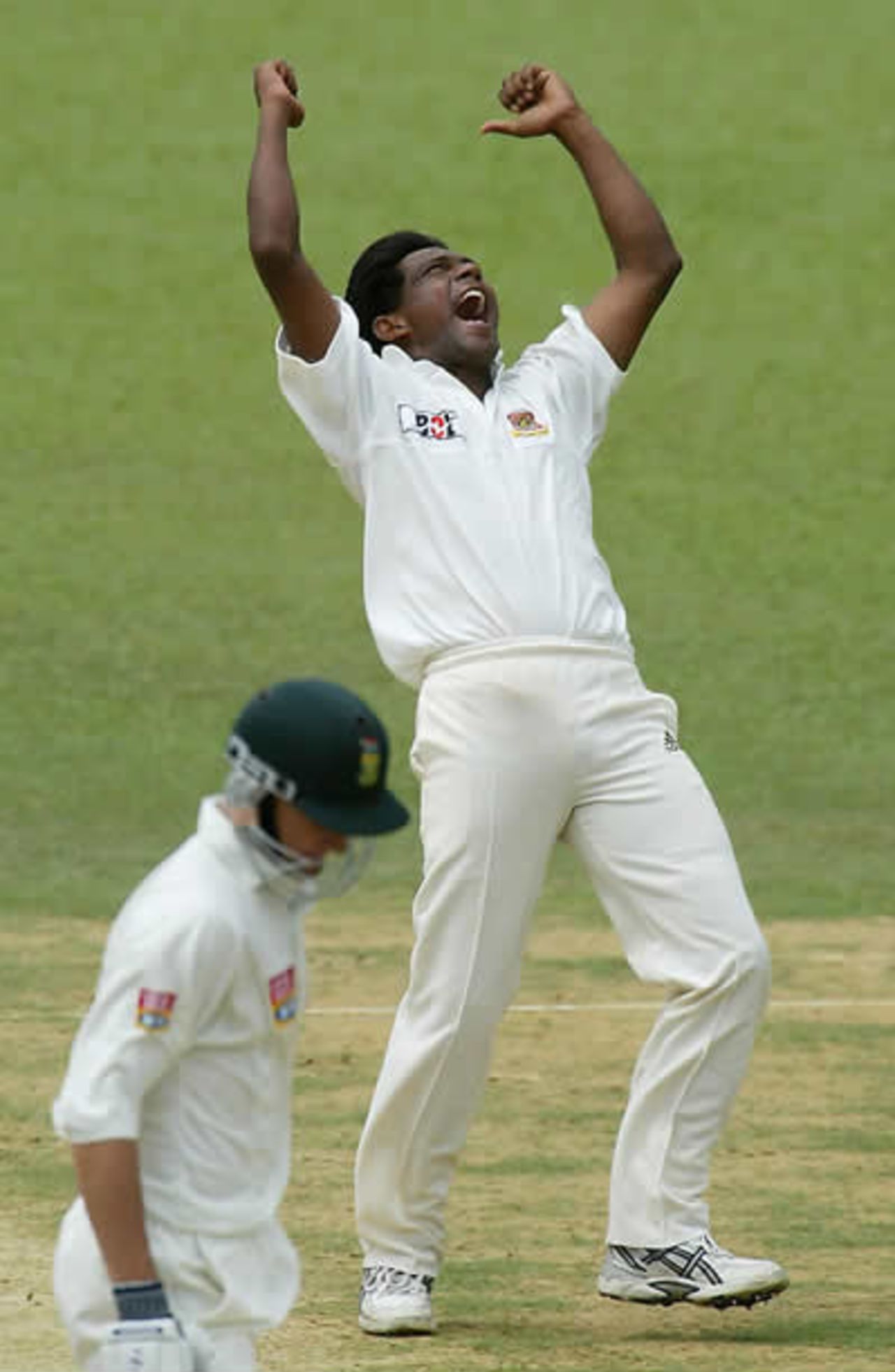 Mohammad Rafique of Bangladesh celebrates taking the wicket of Alan Dawson of South Africa
