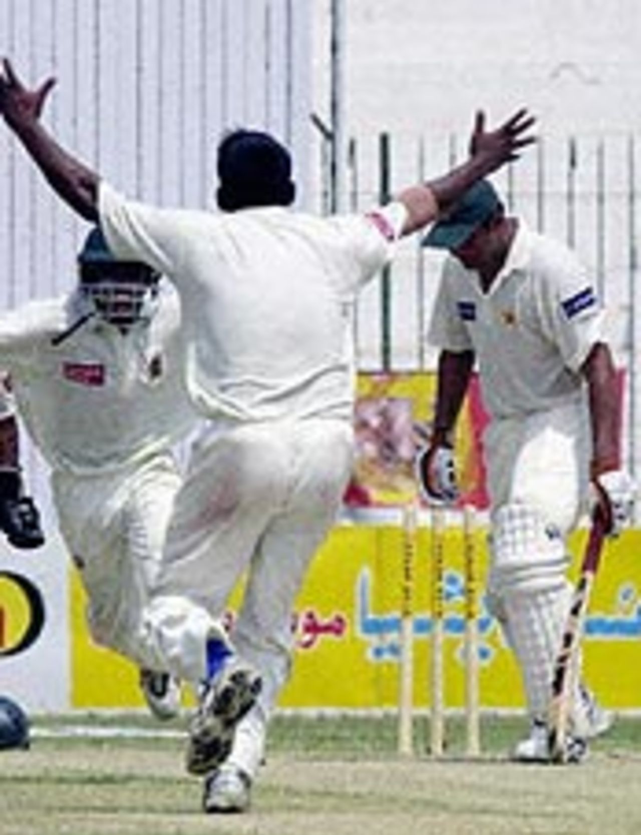 Mohammad Rafique celebrates after dismissing Inzamam-ul-Haq on the third day of the Peshawar Test