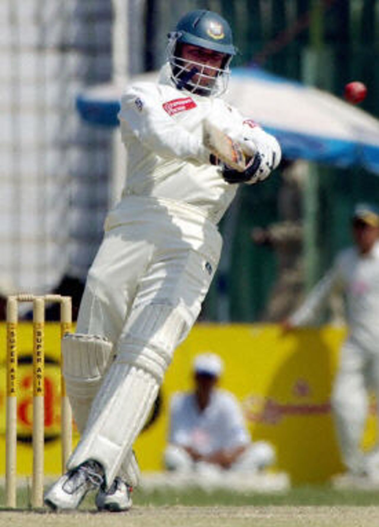 Mashrafe Mortaza hits a ball during the fourth day of the second Test between Pakistan and Bangladesh in Peshawar, 30 August 2003.