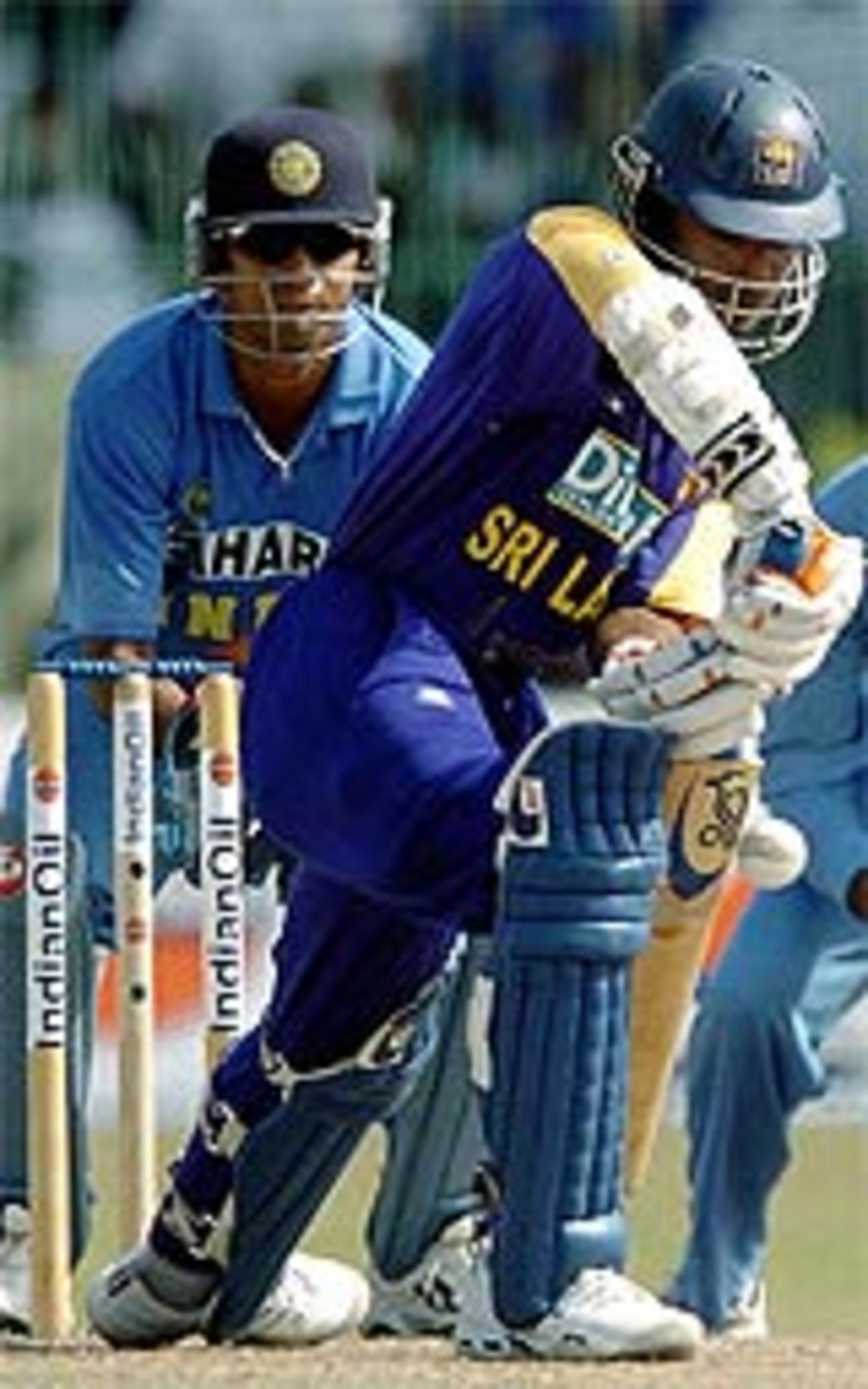 Kumar Sangakkara defends, watched by Rahul Dravid, Sri Lanka v India, Final, Asia Cup, August 1, 2004