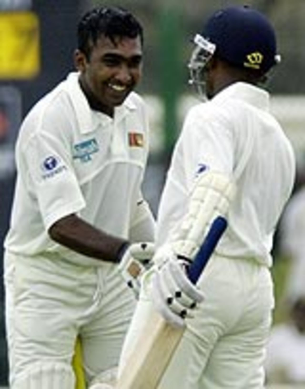 Mahela Jayawardene celebrates his 12th Test century, after single-handedly resisting South Africa's bowlers on the first day at Galle, Sri Lanka v South Africa, 1st Test, Galle, 1st day, August 4, 2004