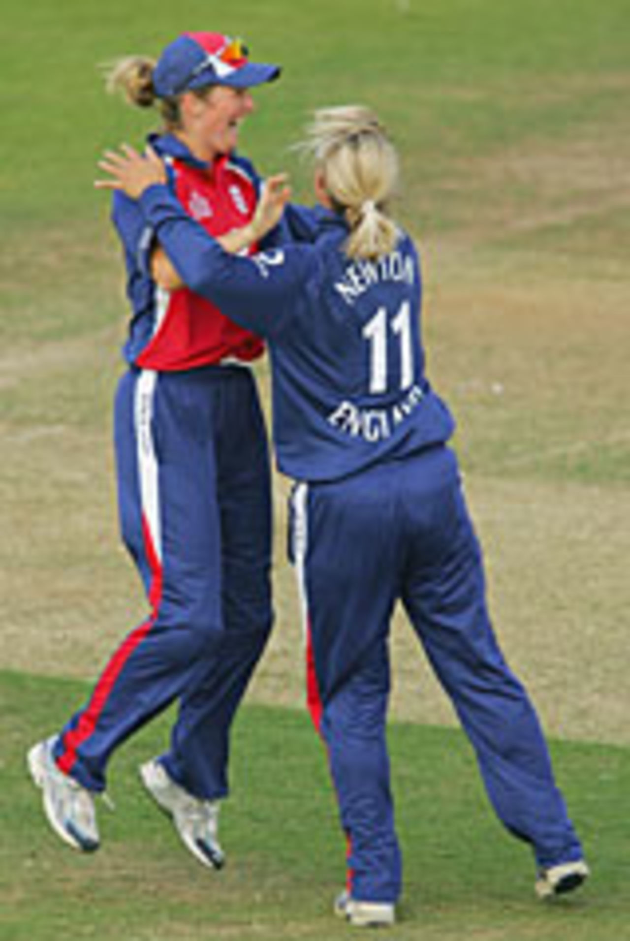 Charlotte Edwards (left) congratulates Laura Newton, England v New Zealand, Twenty20, Hove, August 5, 2004