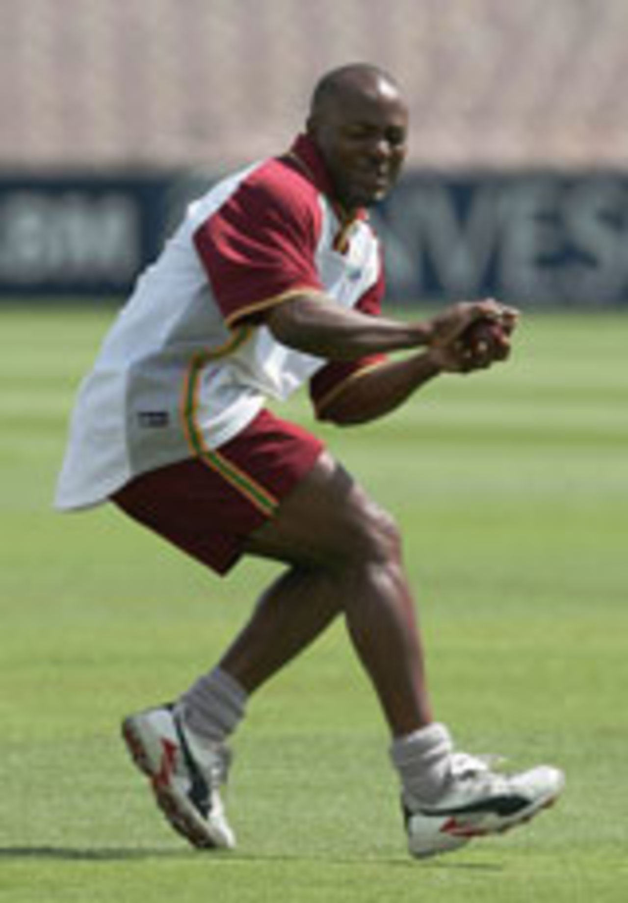 Brian Lara warms up for the third Test, Old Trafford, August 11, 2004