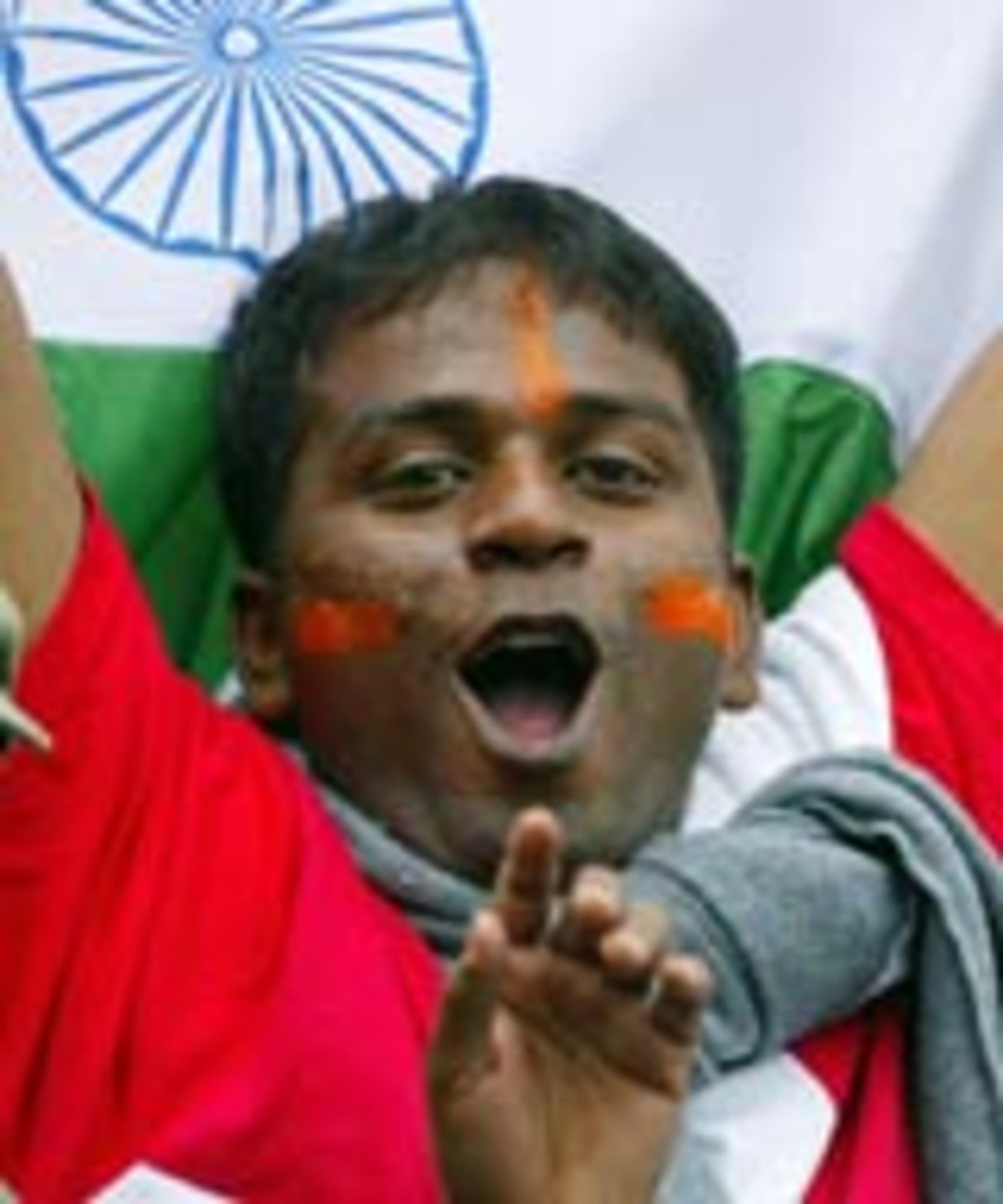 An Indian fan waits for play to start, India v Pakistan, 1st match, Videocon Cup, Amstelveen, August 21, 2004