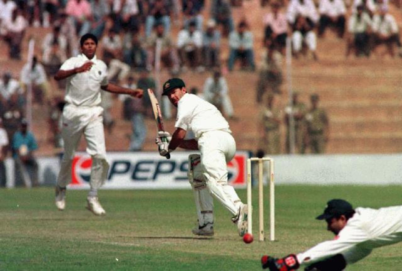 Ricky Ponting turns a ball down the leg side off Venkatesh Prasad. Wicket-keeper Nayan Mongia dives.
