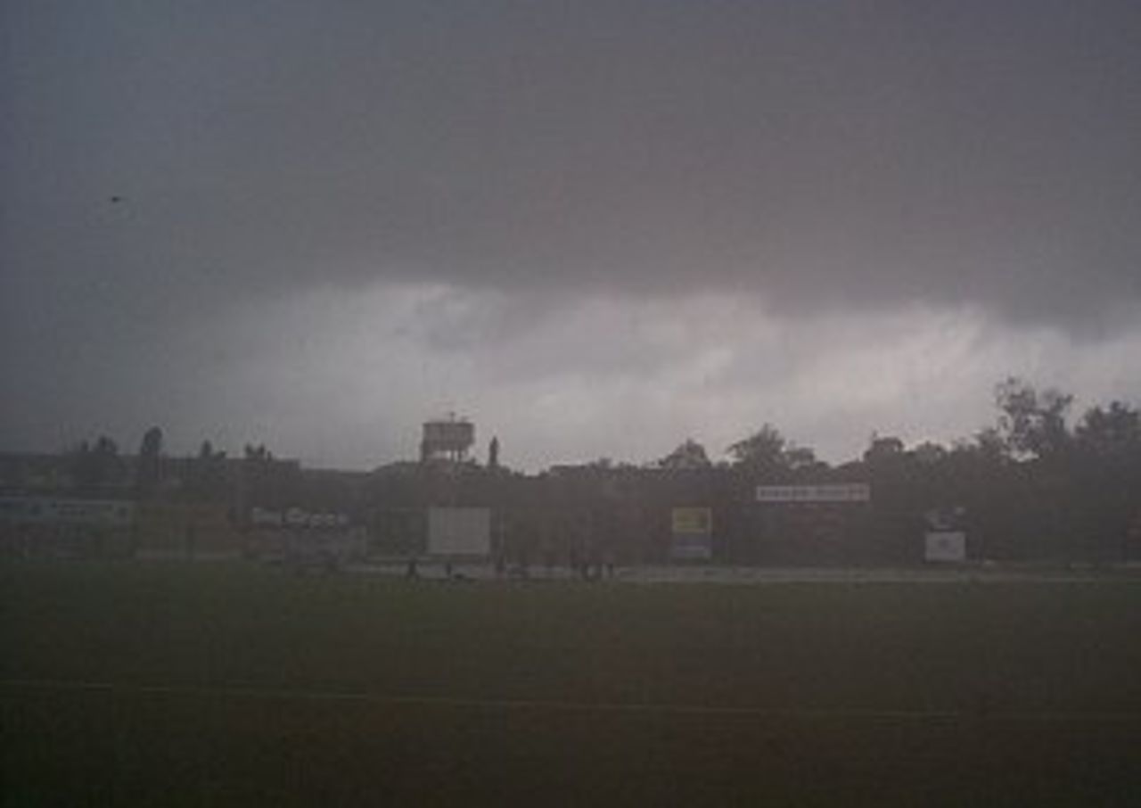 Dark clouds surround P.Saravanamuttu Stadium, Colombo during the first day of the Australians tour match against the Sri Lanka Board XI. 3 September 1999.