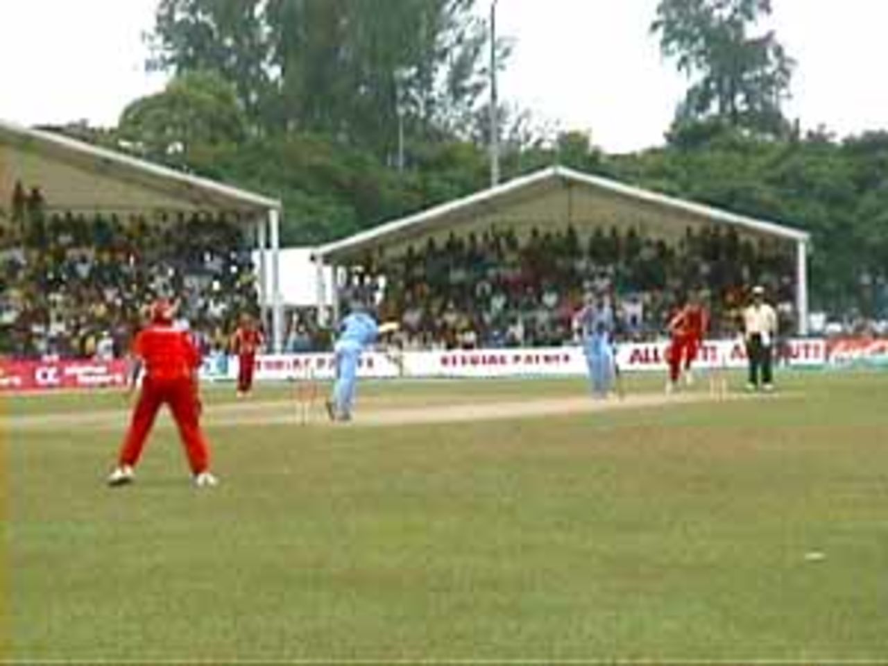 Tendulkar leans into his shot, as he plays a ball through mid-wicket, India v Zimbabwe (2nd ODI), Coca-Cola Singapore Challenge, 1999-2000, Kallang Ground, Singapore, 4 Sep 1999.