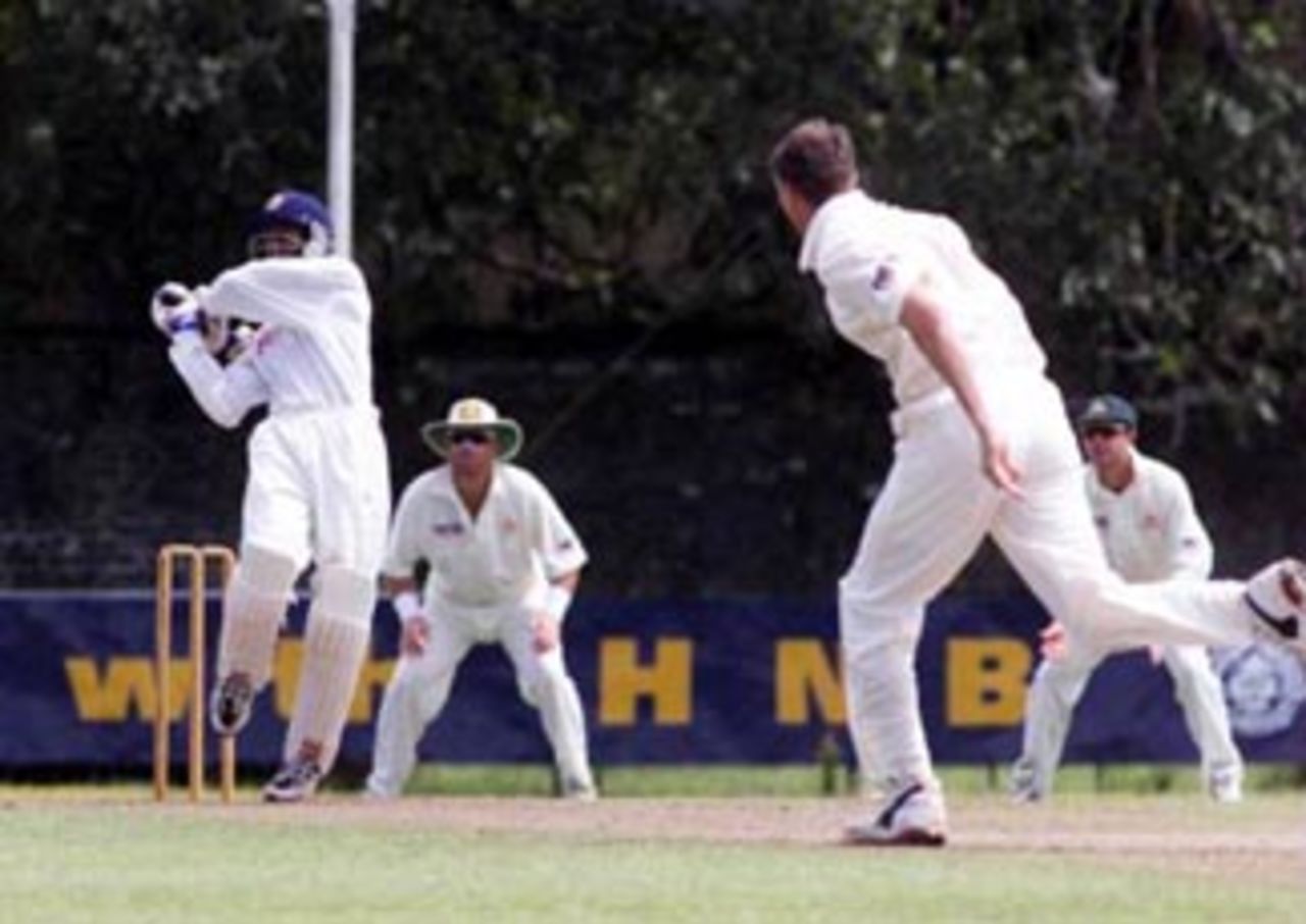 4 Sep 1999: Russel Arnold of the Board XI hits Glenn McGrath of Australia for four, during day two of the tour match between the Sri Lanka Board XI and Australia at Saravanamuttu Stadium, Colombo, Sri Lanka.