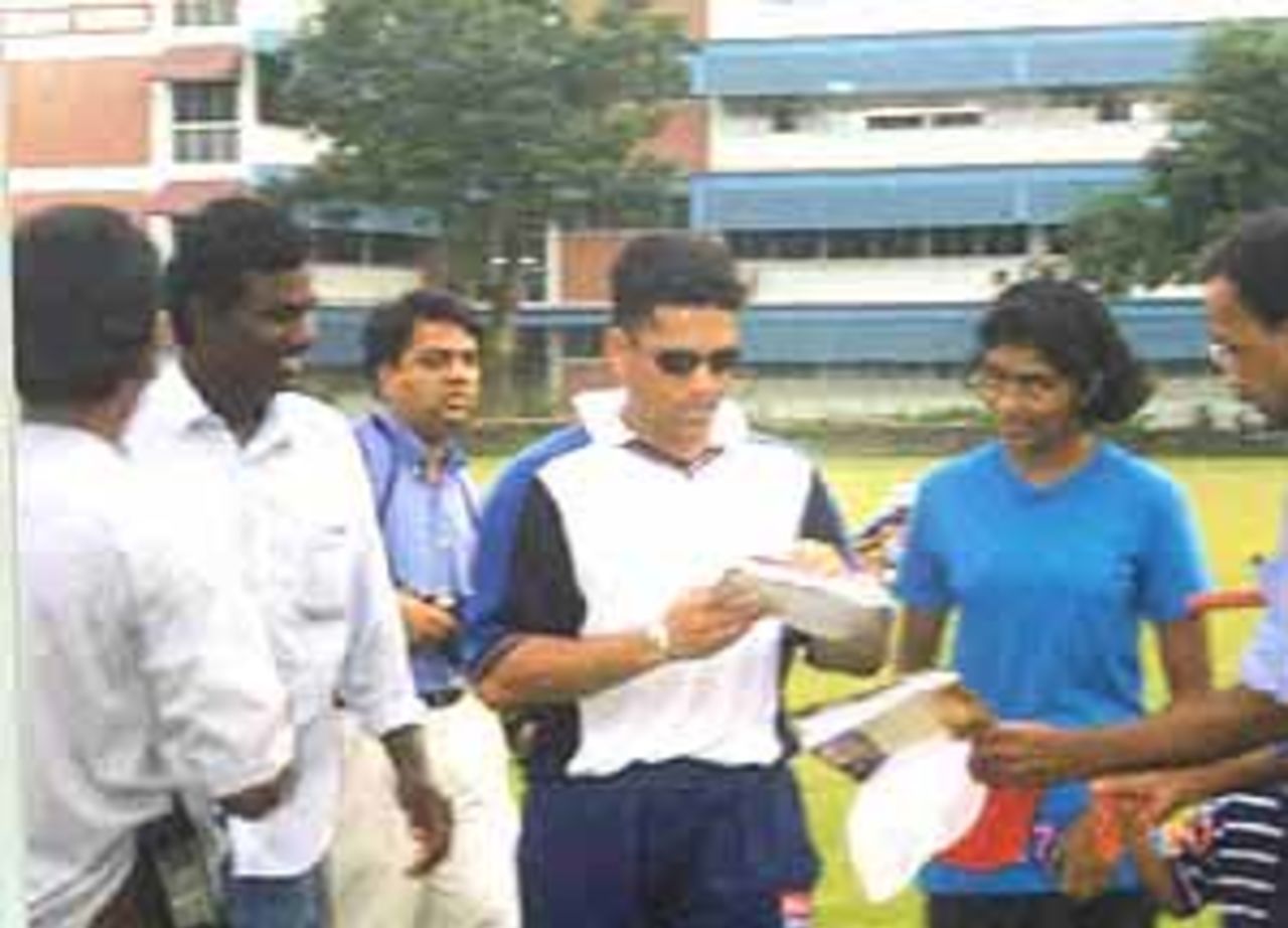Tendulkar signing autographs at CSC, Coca-Cola Singapore Challenge, 1999-2000, Singapore.