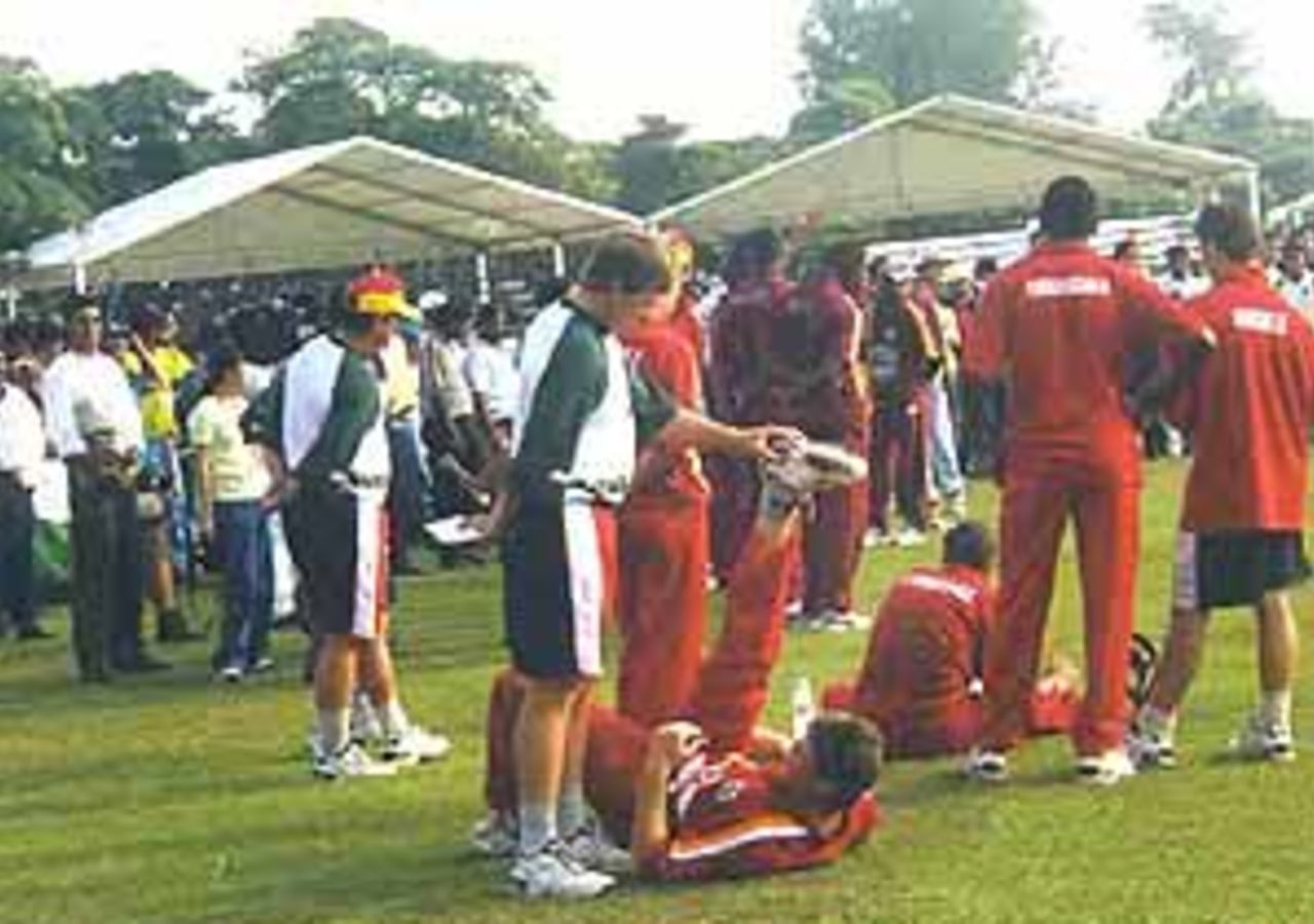 Zimbabweans waiting at the presentation ceremony after 1st Match, Coca-Cola Singapore Challenge, 1999-2000, Kallang Ground, Singapore, 2 Sep 1999.