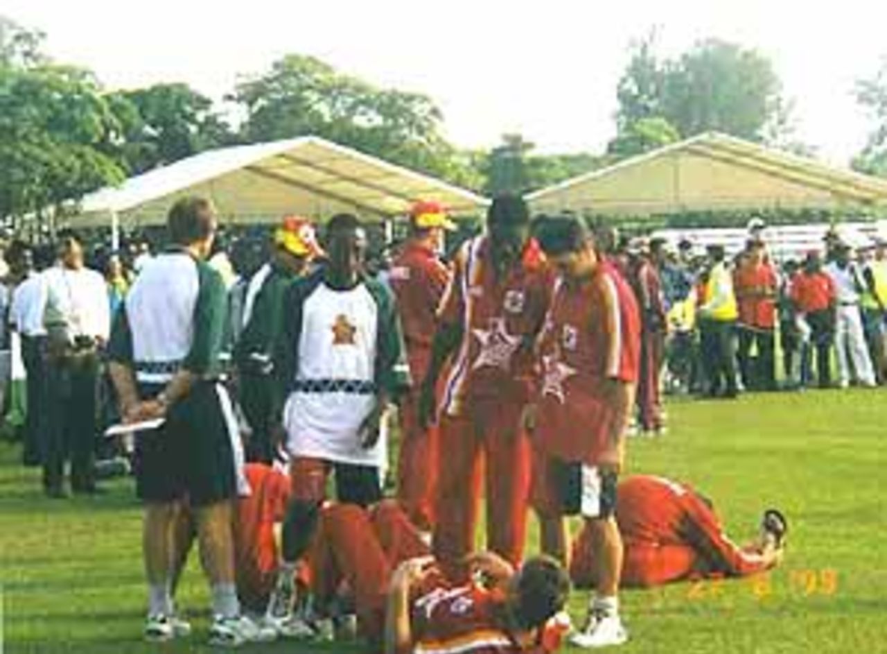 Zimbabwe players before the presentation, 1st Match, West Indies v Zimbabwe Coca-Cola Singapore Challenge, 1999-2000, Kallang Ground, Singapore, 2 Sep 1999.